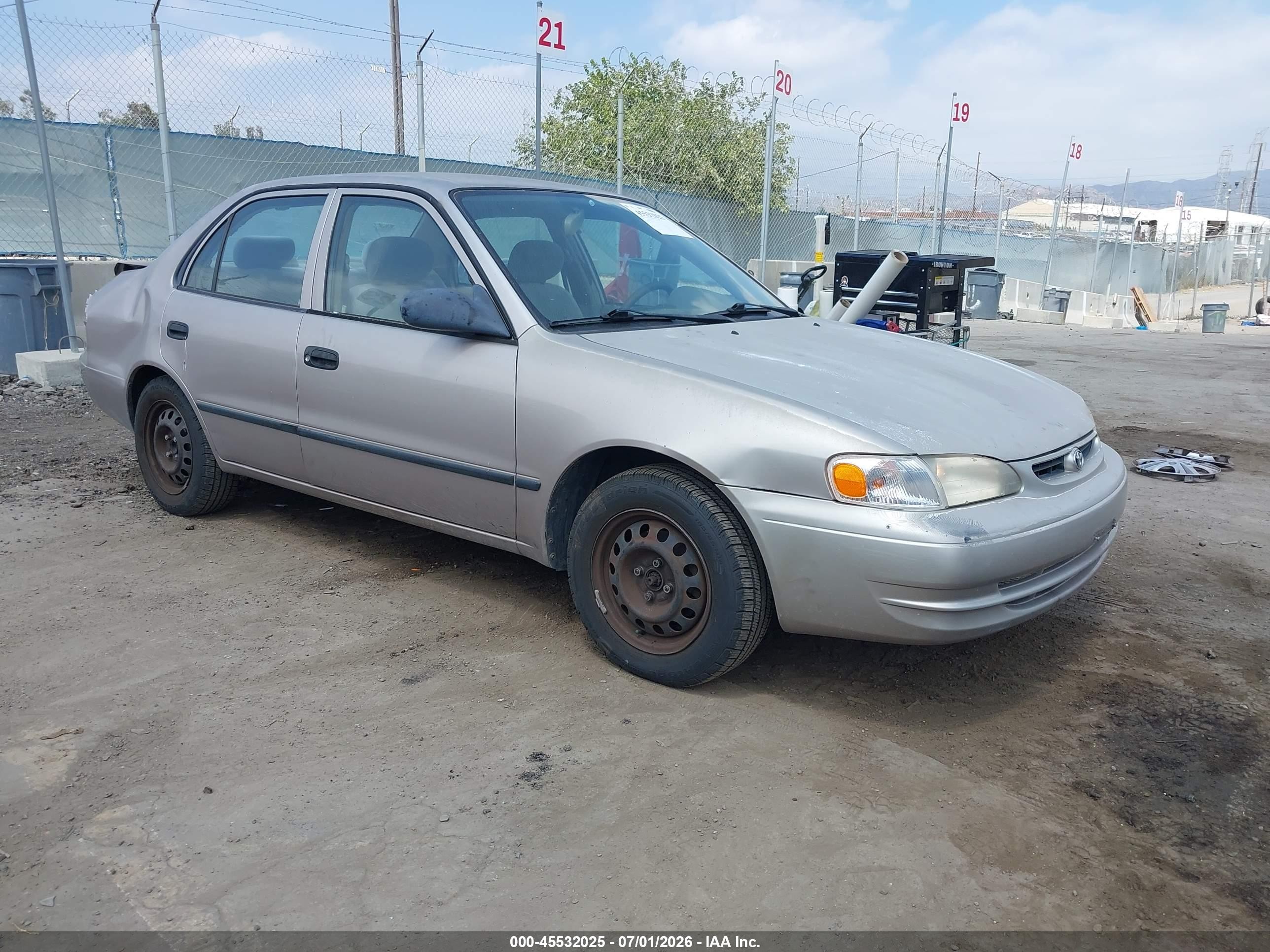 2000 Toyota Corolla CE, VIN 1NXBR12E6YZ404580 — Rear end