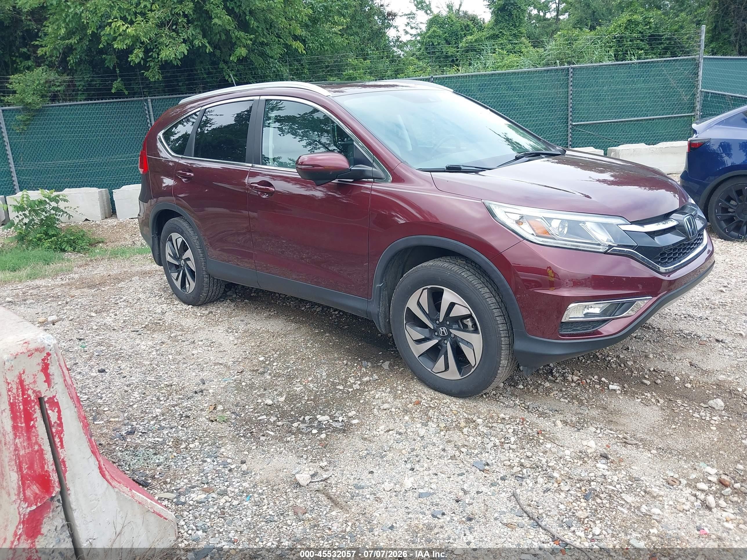 2015 Honda CR-V Touring, VIN 5J6RM4H92FL068369 — Rear end