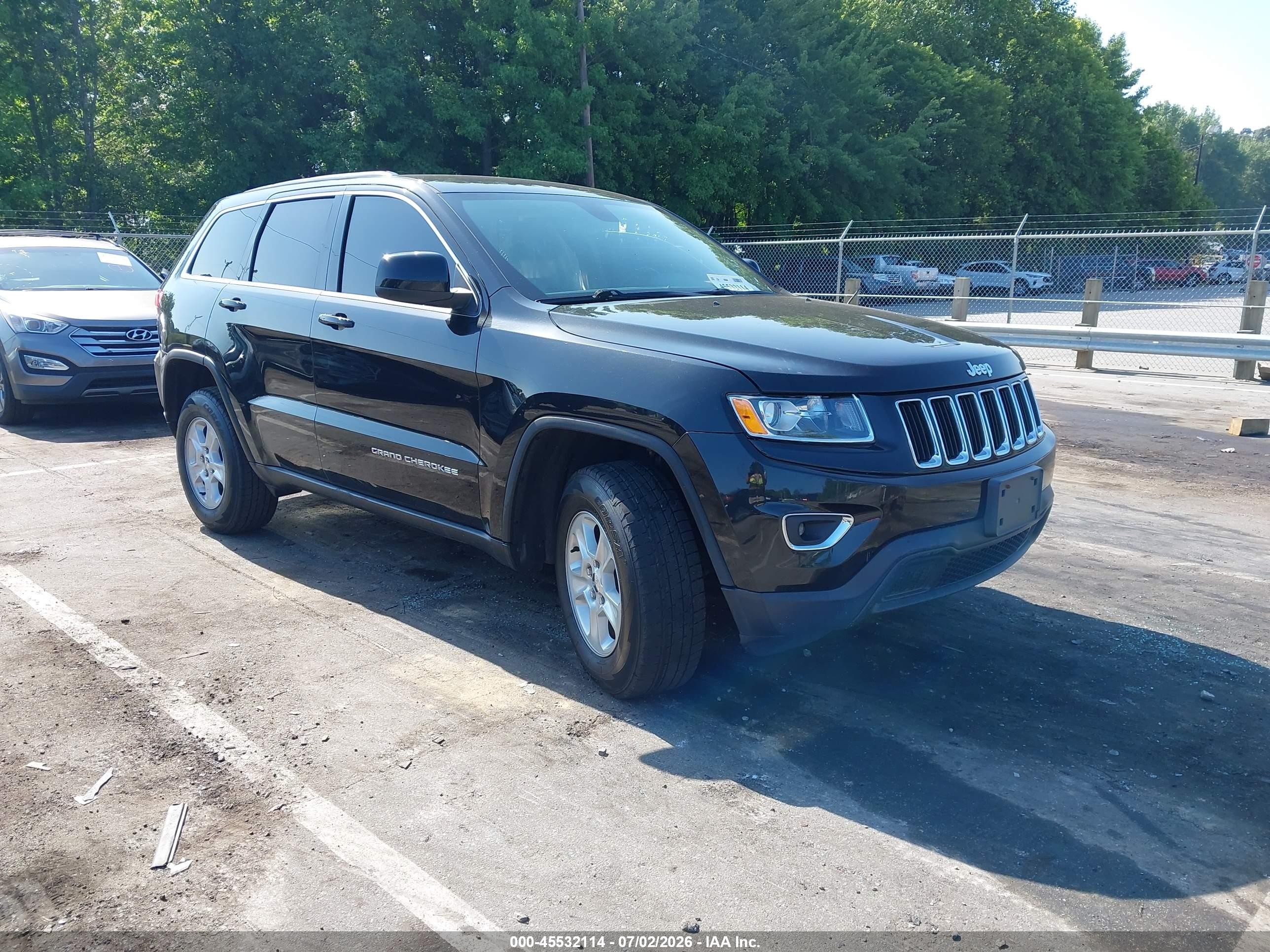 2015 Jeep Grand Cherokee Altitude, VIN 1C4RJFAG9FC919151 — Бок