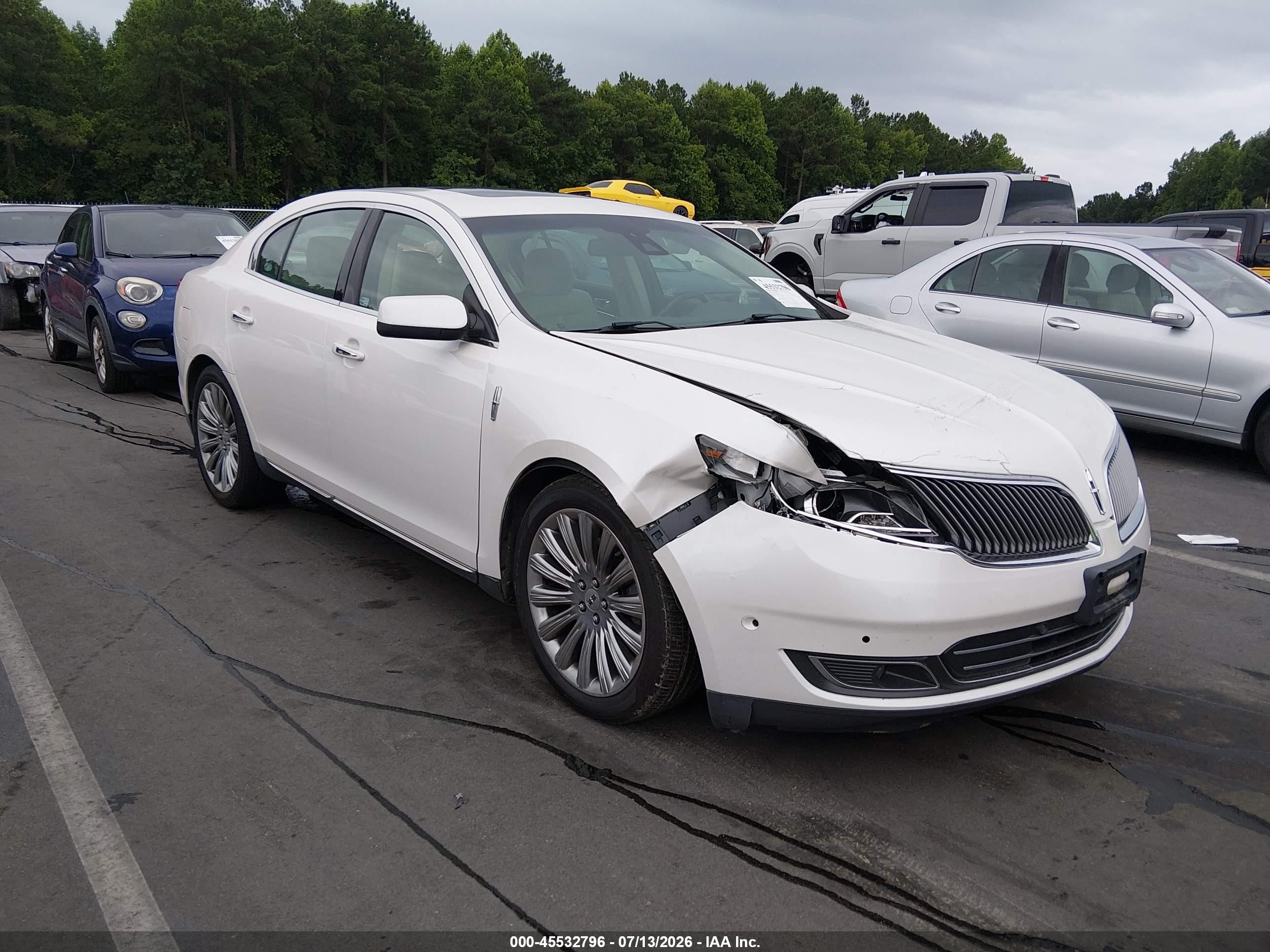 2014 Lincoln MKS, VIN 1LNHL9DKXEG612033 — Front end