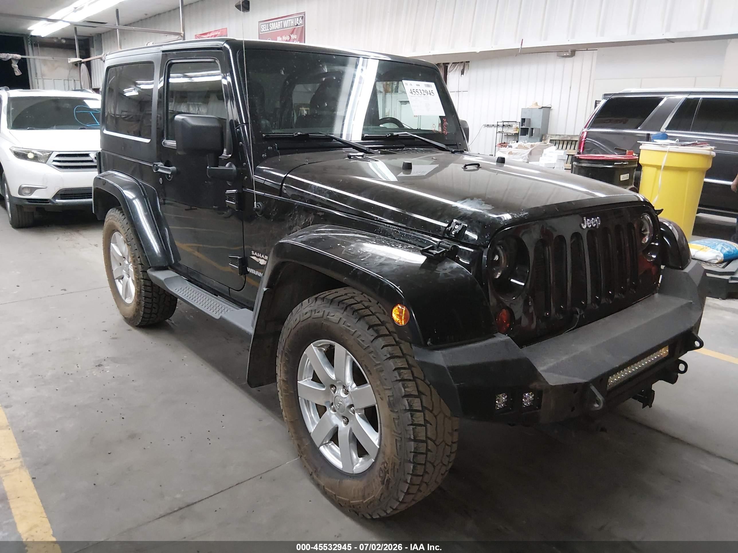 2012 Jeep Wrangler Sahara, VIN 1C4AJWBG9CL149198 — Not stated