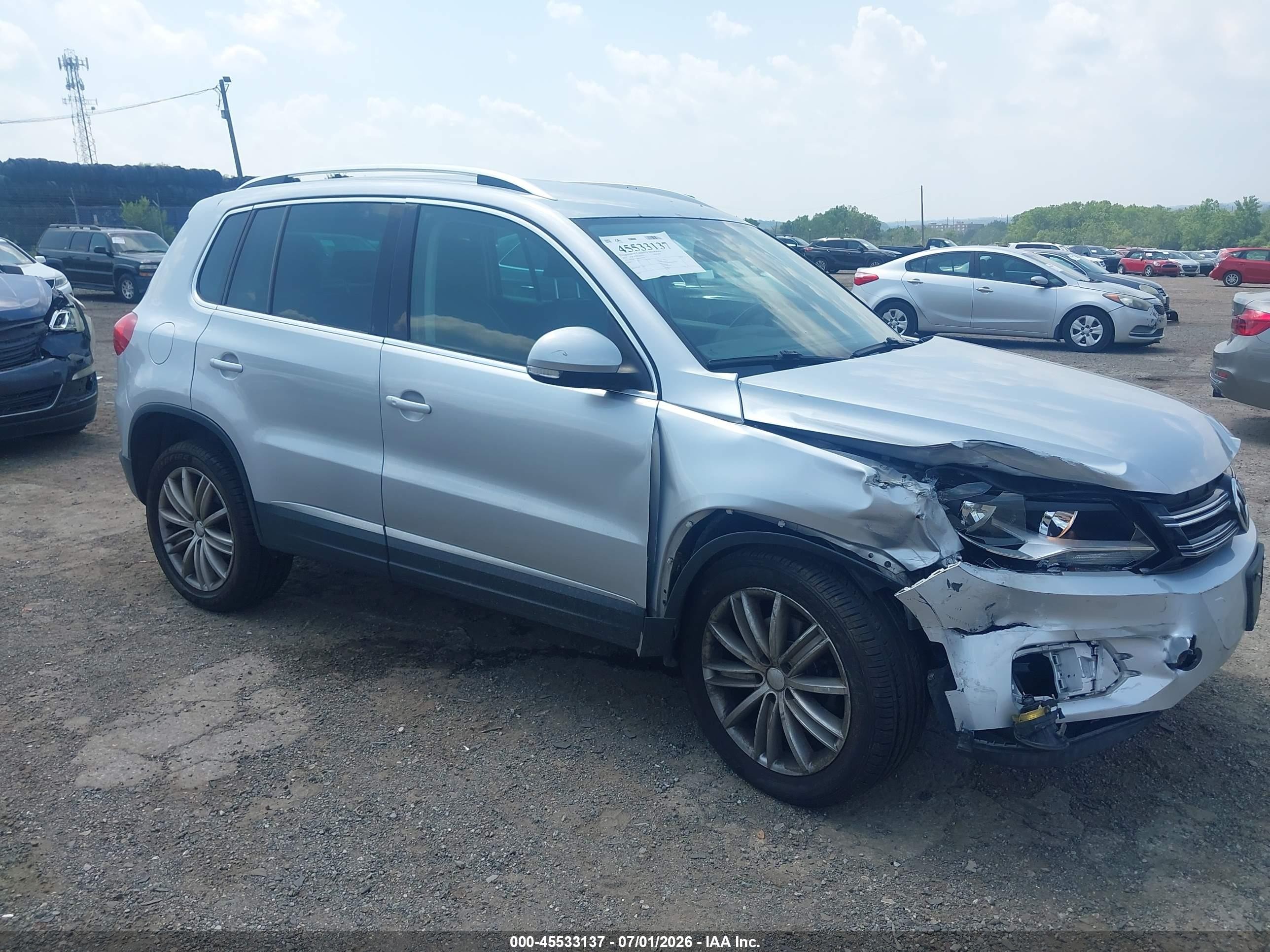 2014 Volkswagen Tiguan S, VIN WVGBV3AX0EW573763 — Front end