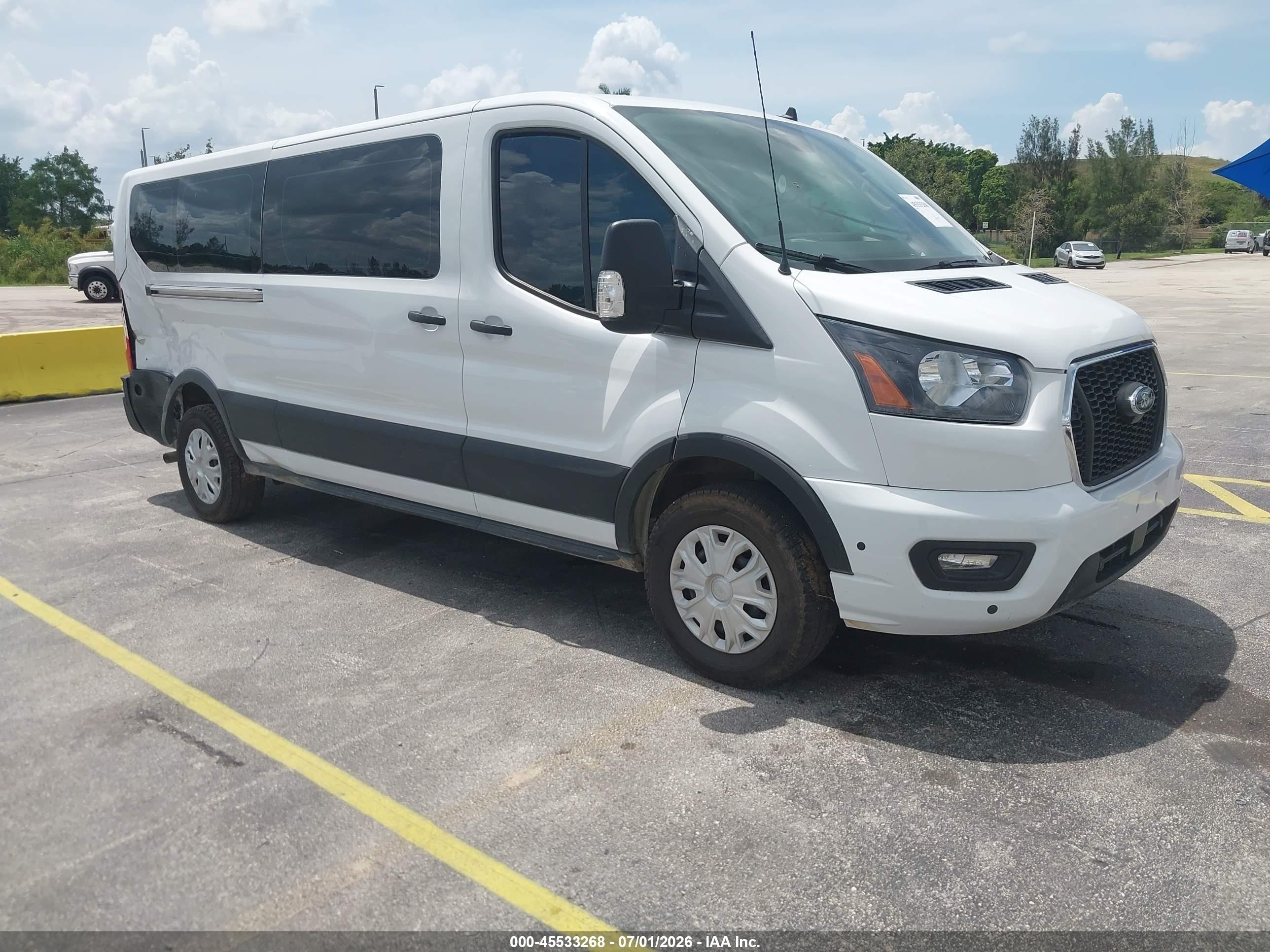 2024 Ford Transit Passenger XLT, VIN 1FBAX2Y87RKA01920 — Side
