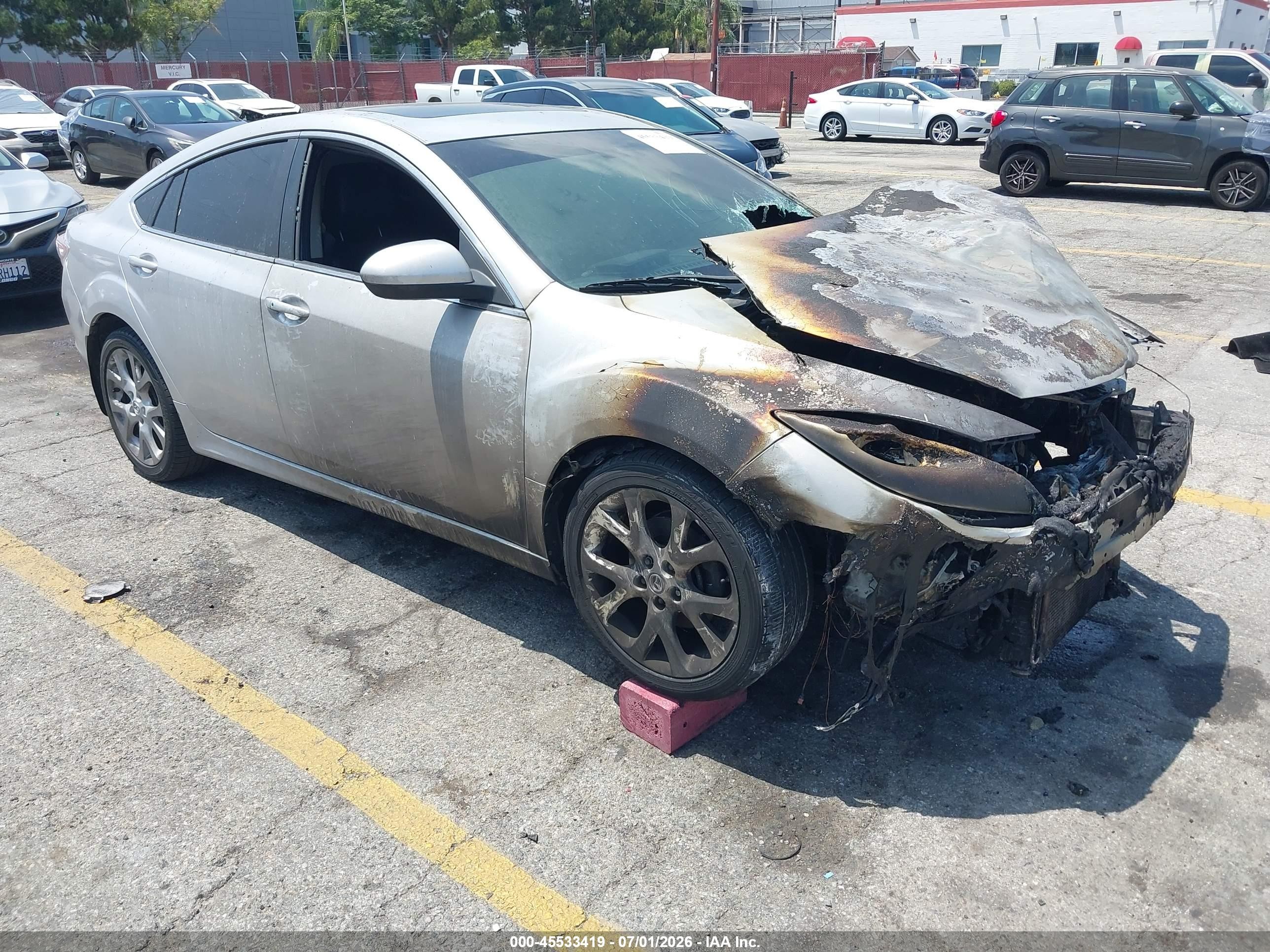 2009 Mazda 6 S Grand Touring, VIN 1YVHP82B395M11253 — Engine fire