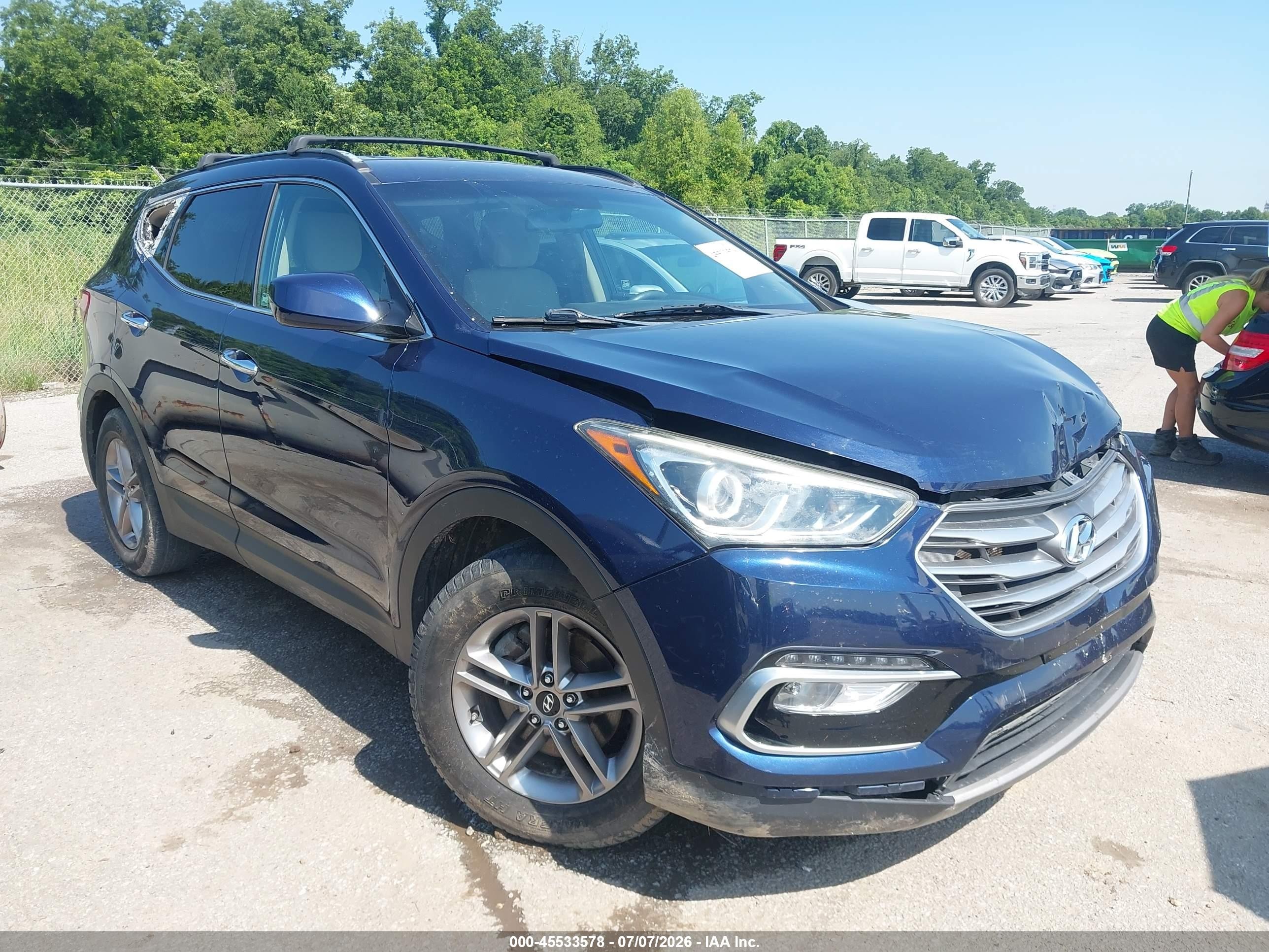 2017 Hyundai Santa Fe 2.4L, VIN 5XYZU3LB1HG452975 — Front end