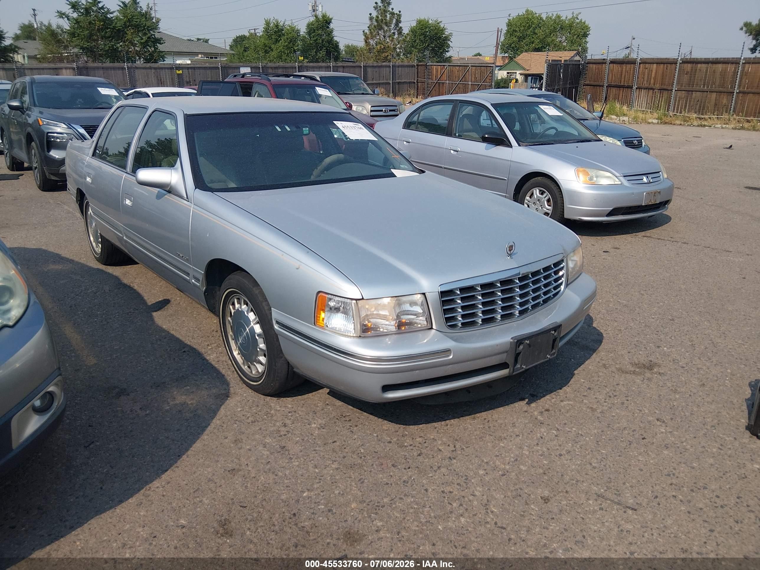 1999 Cadillac DeVille, VIN 1G6KD54Y4XU806083 — Normal wear