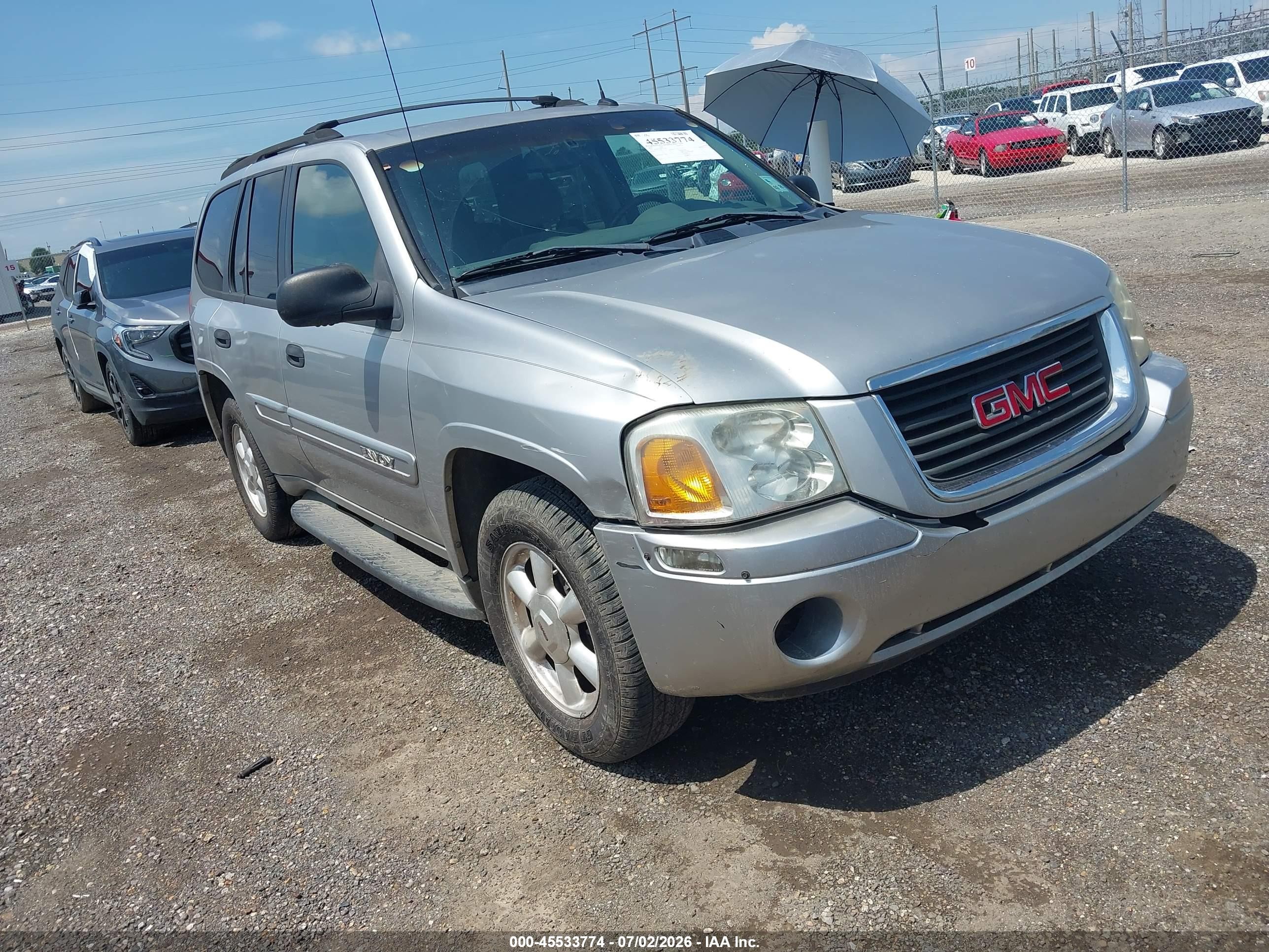 2004 GMC Envoy SLE, VIN 1GKDS13S842351459 — Water / flood