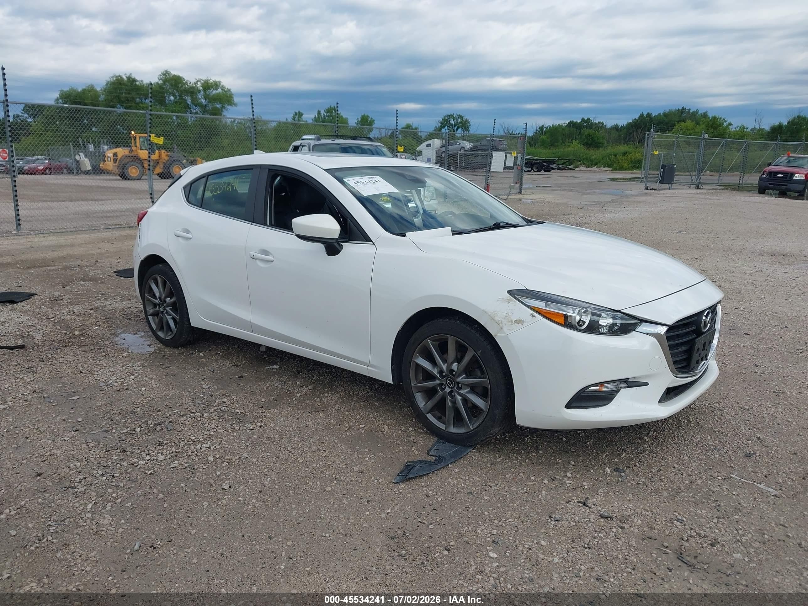 2018 Mazda 3 Touring, VIN 3MZBN1L34JM172257 — Rear end