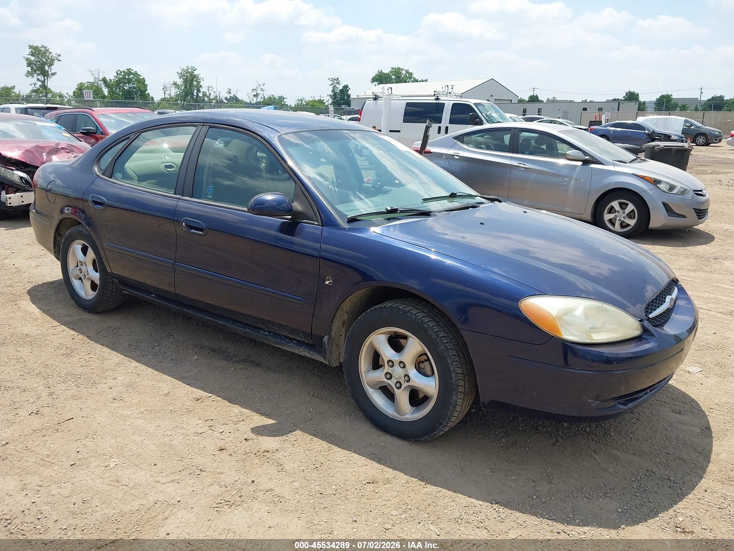 2001 Ford Taurus SES, VIN 1FAFP552X1A266480 — Бок