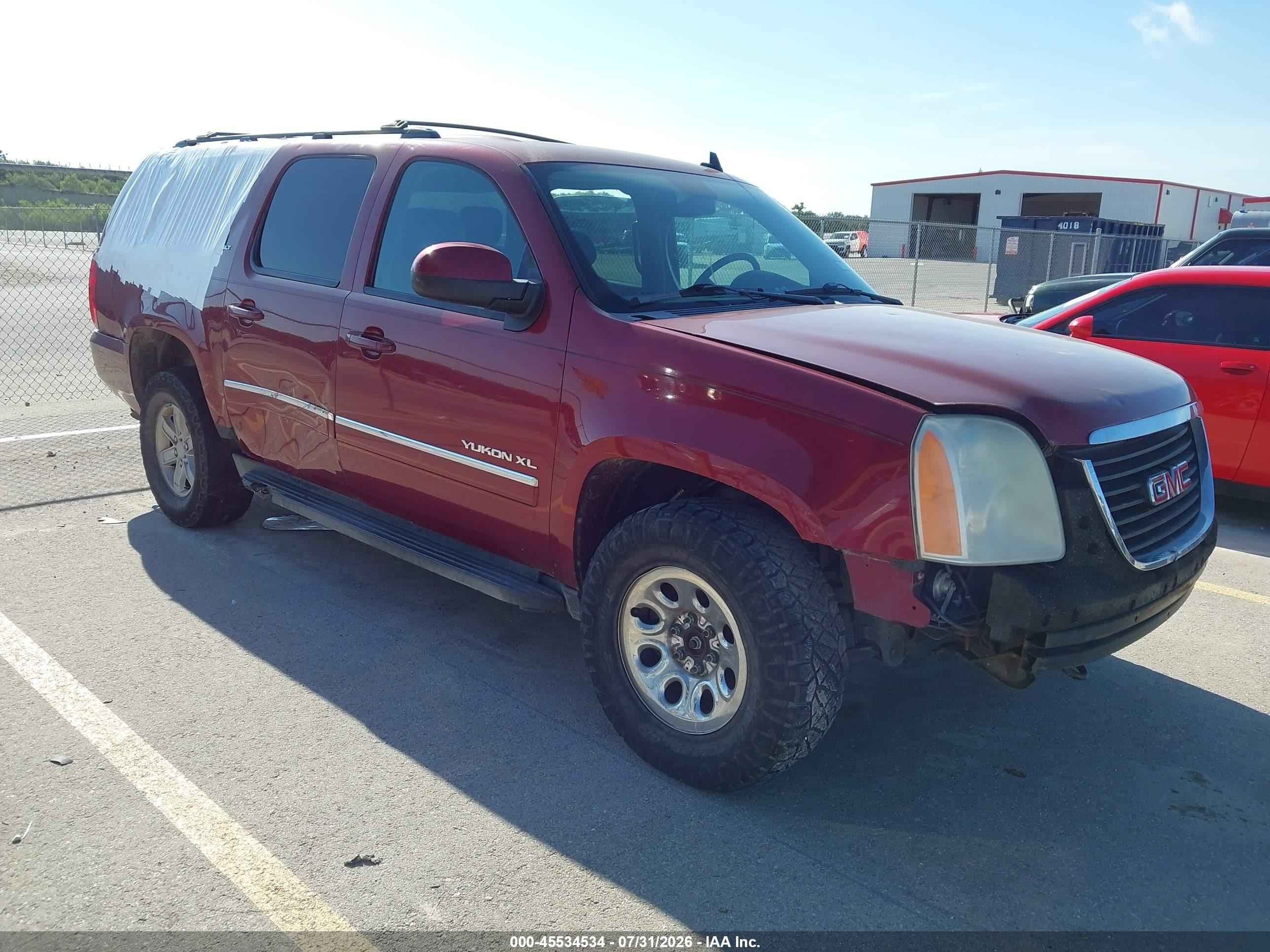 2011 GMC Yukon XL SLT, VIN 1GKS2KE32BR149787 — Normal wear