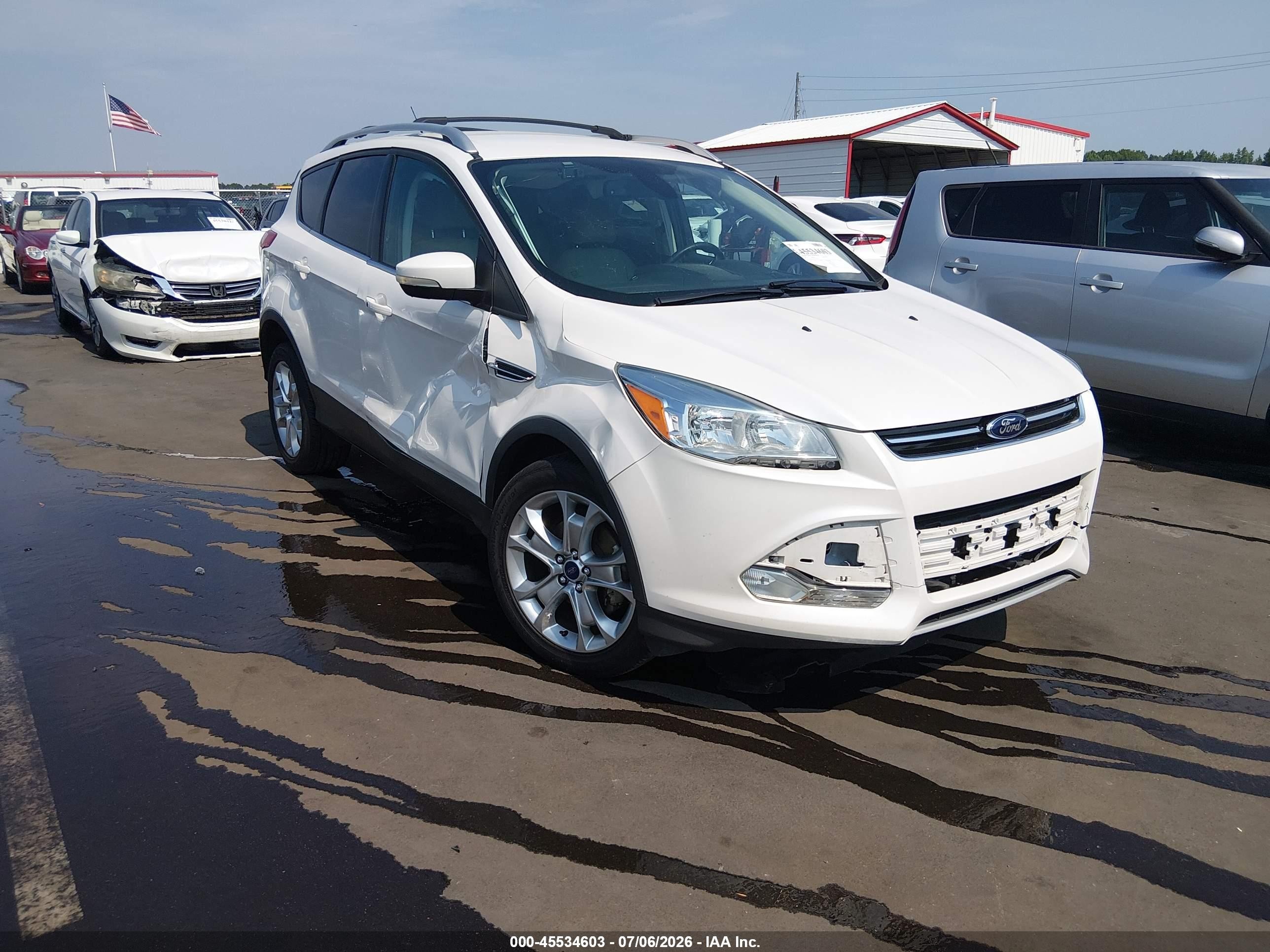 2014 Ford Escape Titanium, VIN 1FMCU0JX4EUC81373 — Storm