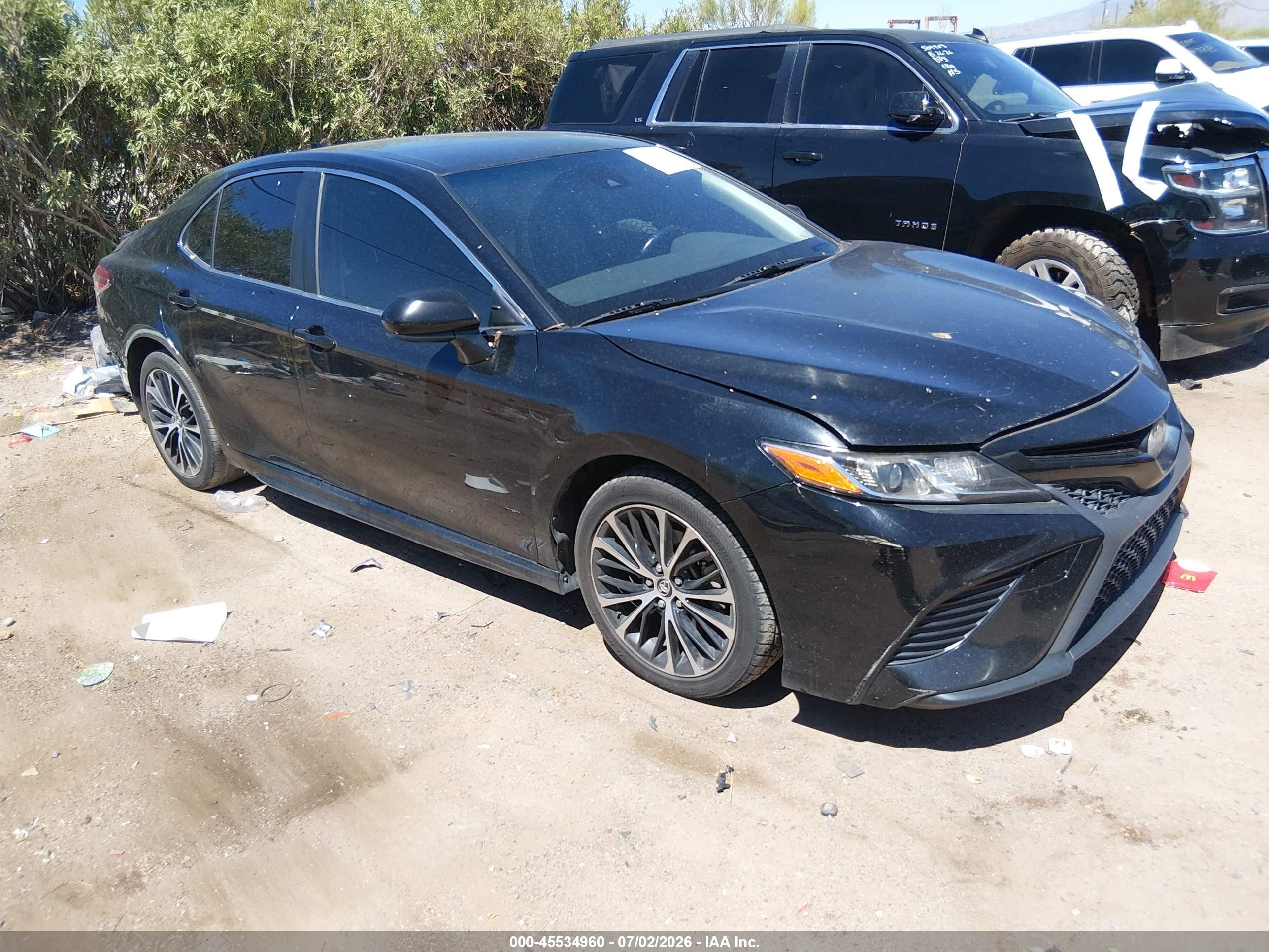 2019 Toyota Camry SE, VIN JTNB11HK1K3080665 — Rear end