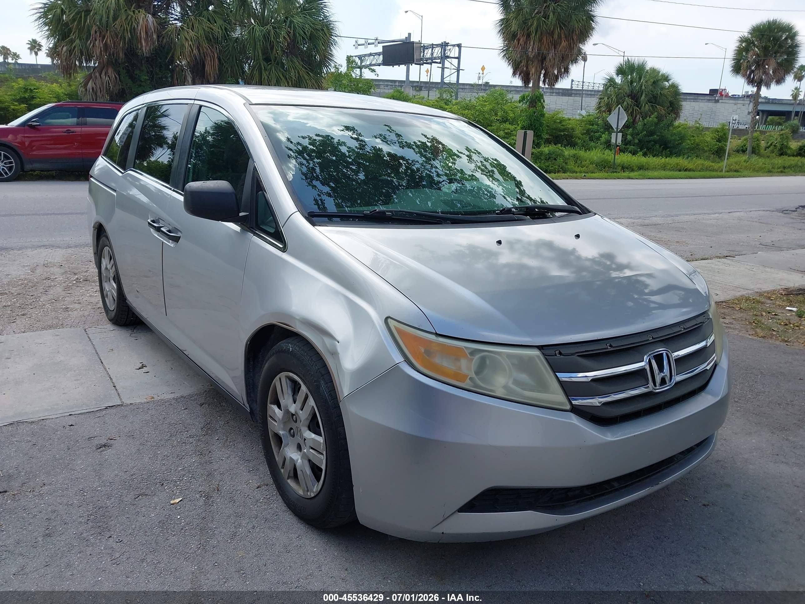 2012 Honda Odyssey LX, VIN 5FNRL5H20CB012723 — Side