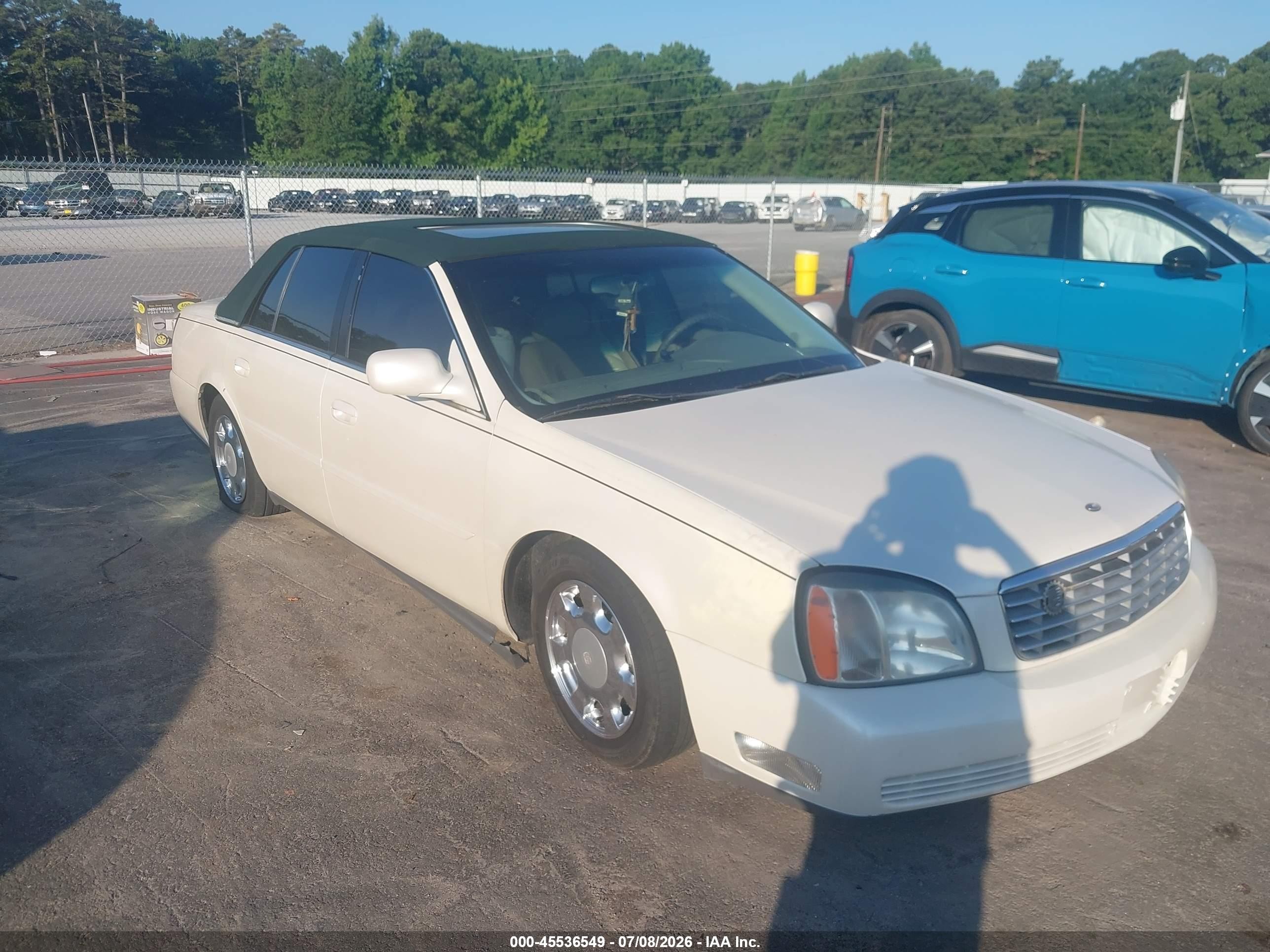 2002 Cadillac DeVille Livery, VIN 1G6KD54Y22U250994 — Normal wear