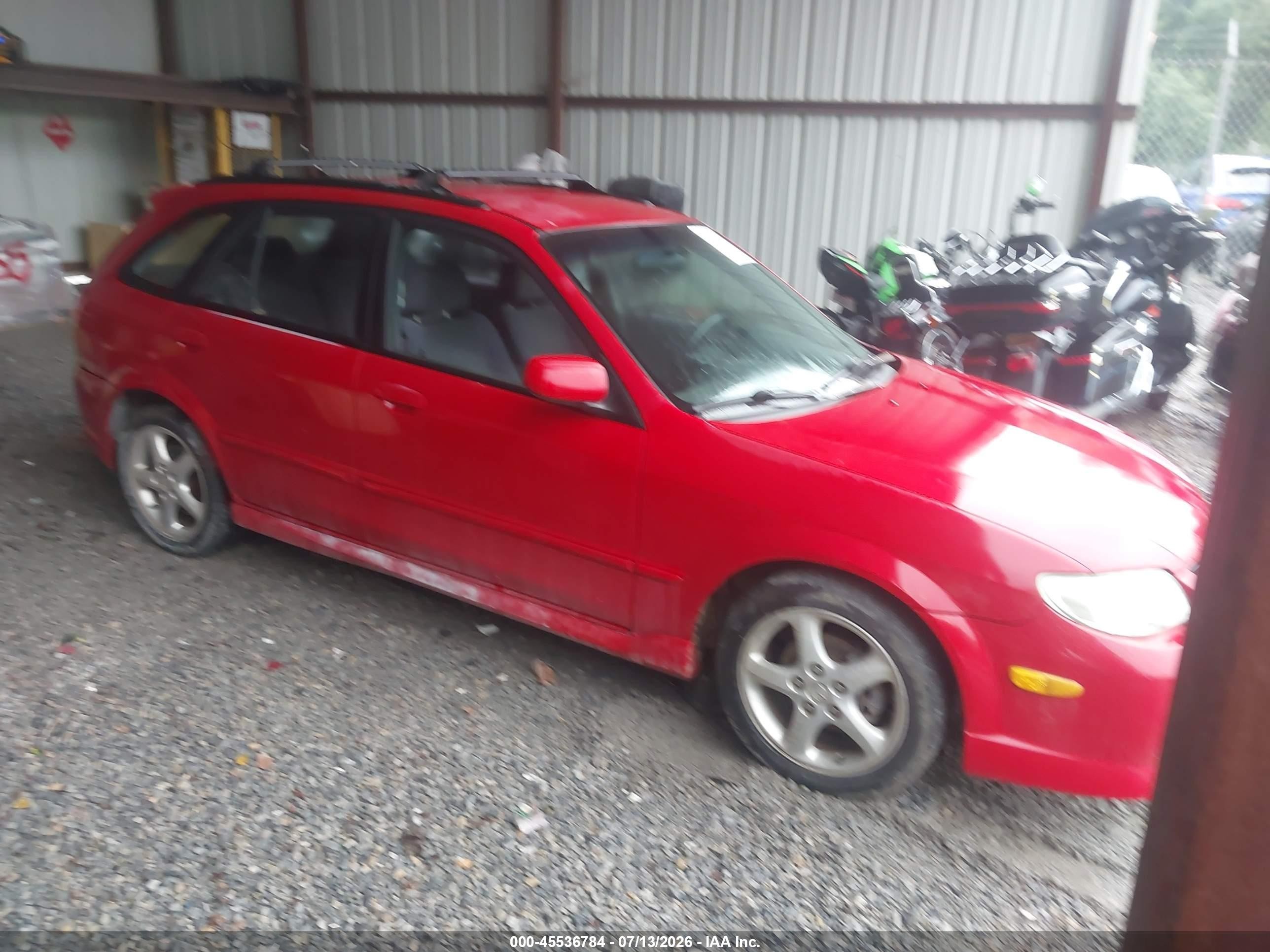 2002 Mazda Protege, VIN JM1BJ245921495254 — Rear end