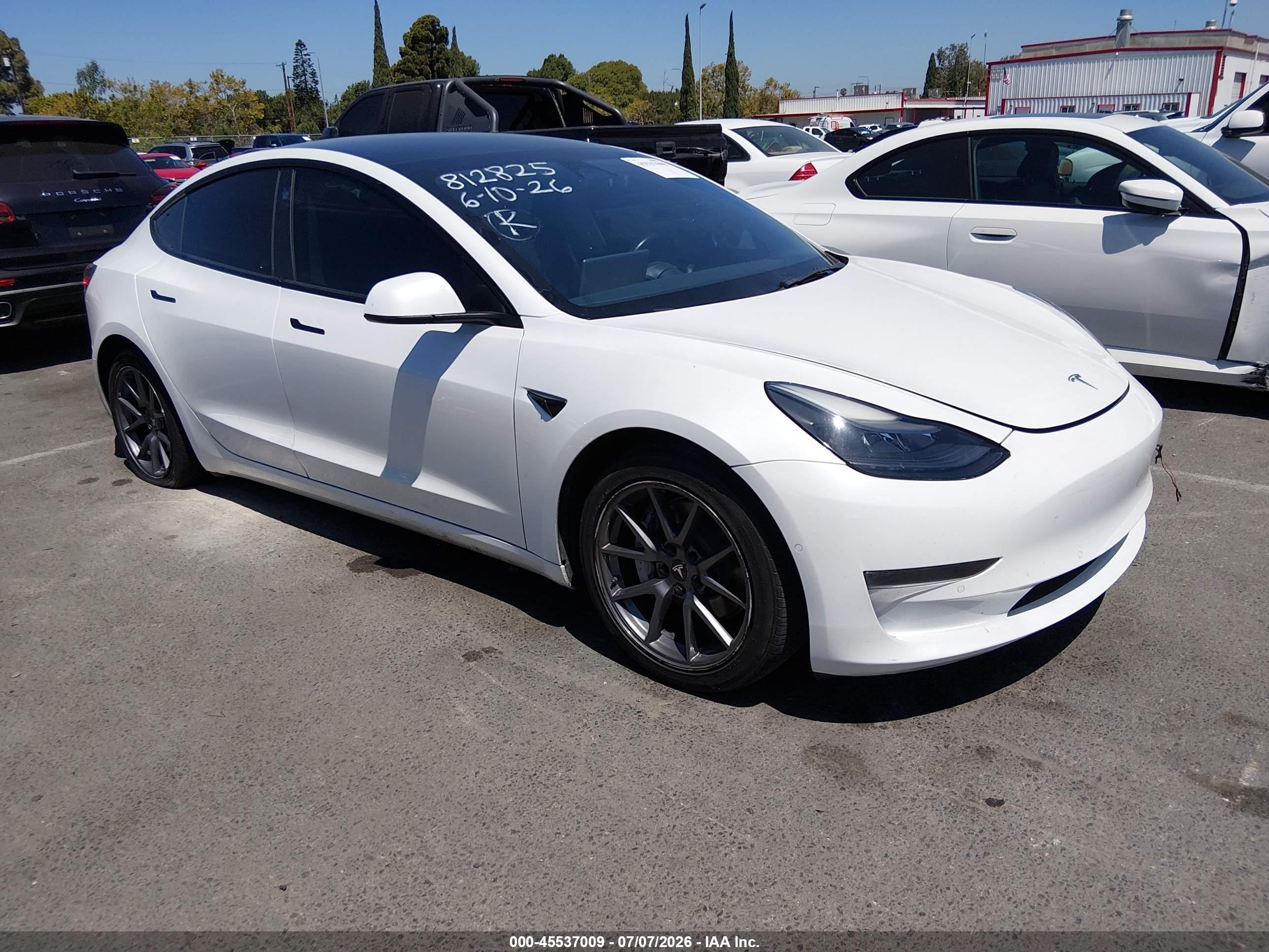 2022 Tesla Model 3, VIN 5YJ3E1EA9NF309299 — Rear end