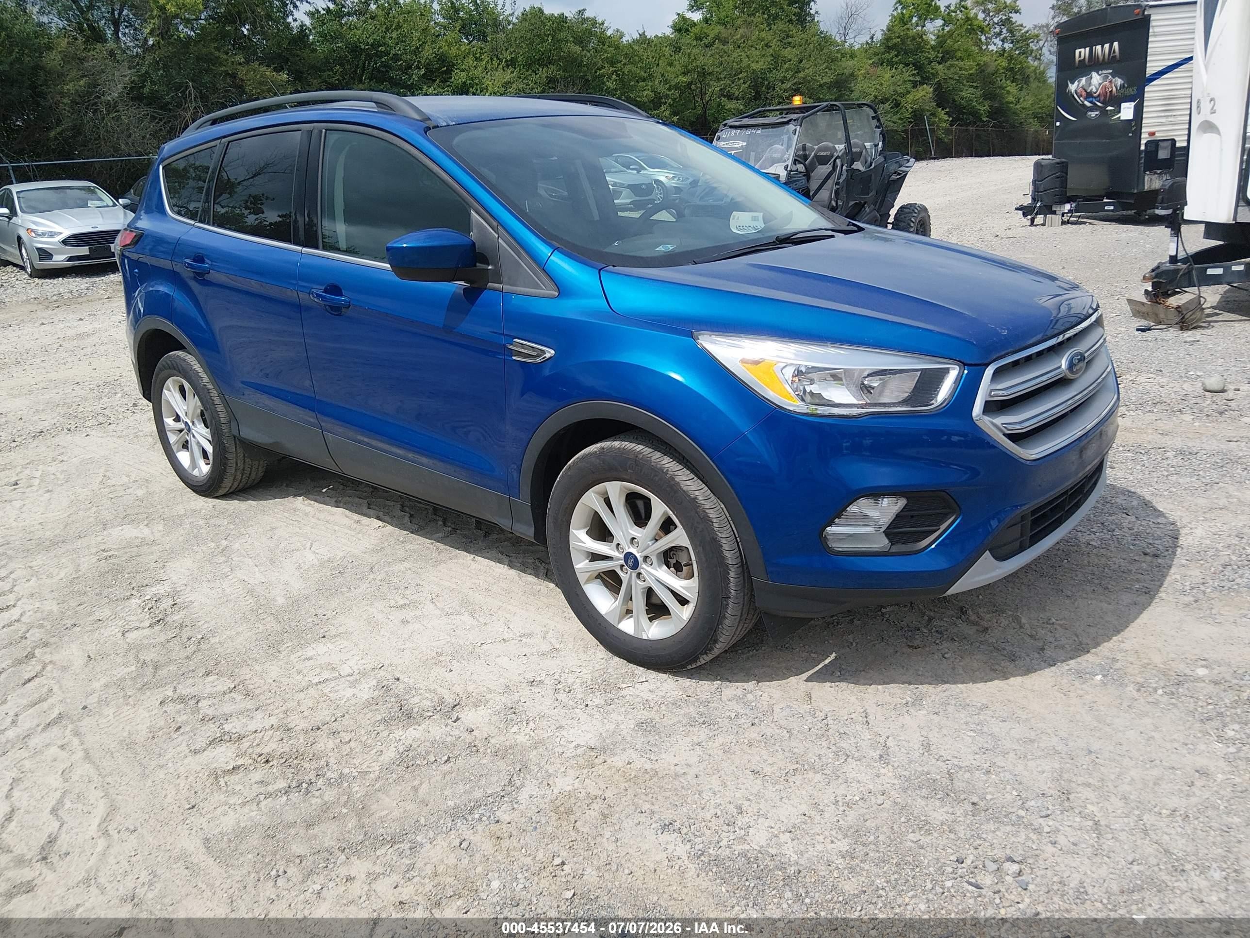 2018 Ford Escape SE, VIN 1FMCU9GD1JUD08802 — Side