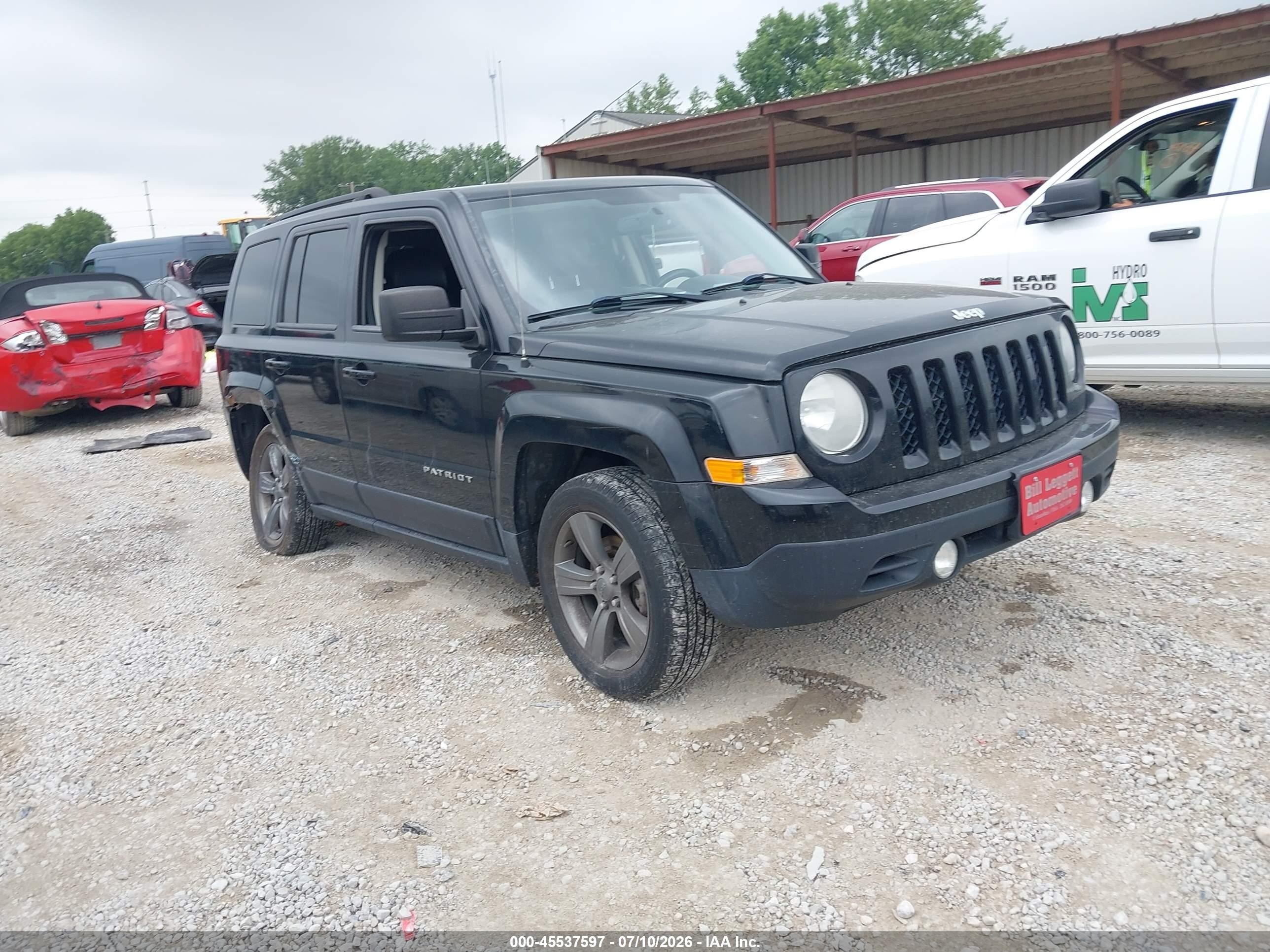 2014 Jeep Patriot High Altitude, VIN 1C4NJPFA1ED857441 — Side