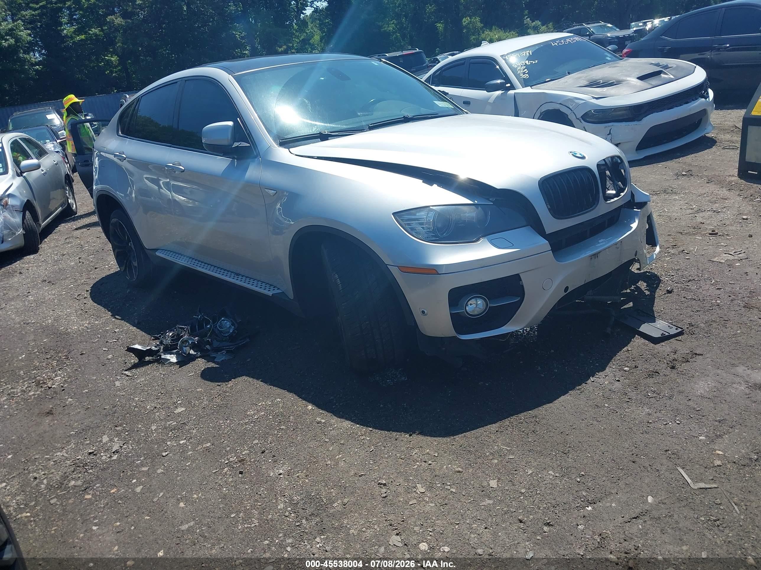 2012 BMW X6 50i, VIN 5UXFG8C5XCL590012 — Side