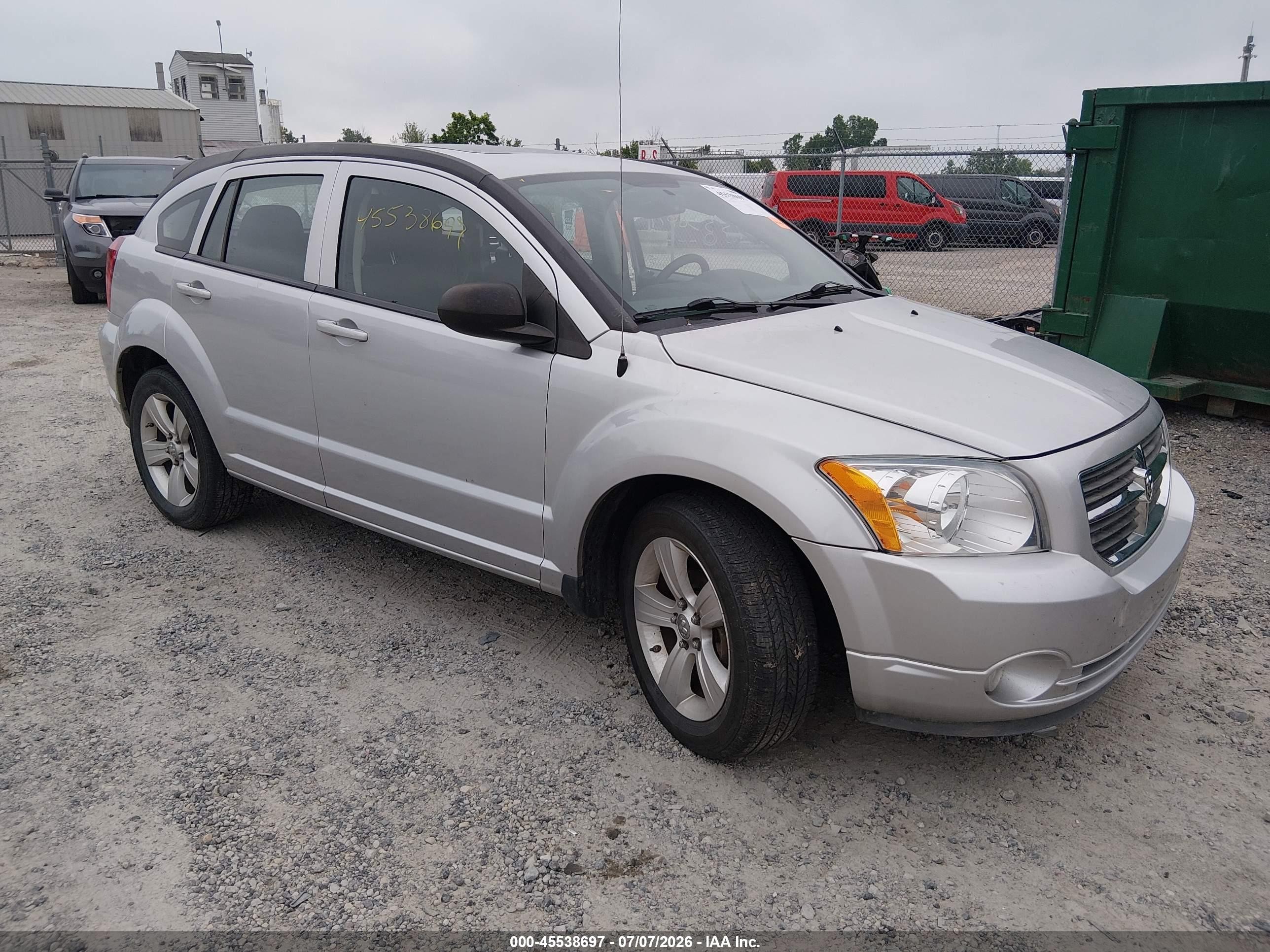 2011 Dodge Caliber Mainstreet, VIN 1B3CB3HA0BD182558 — Side