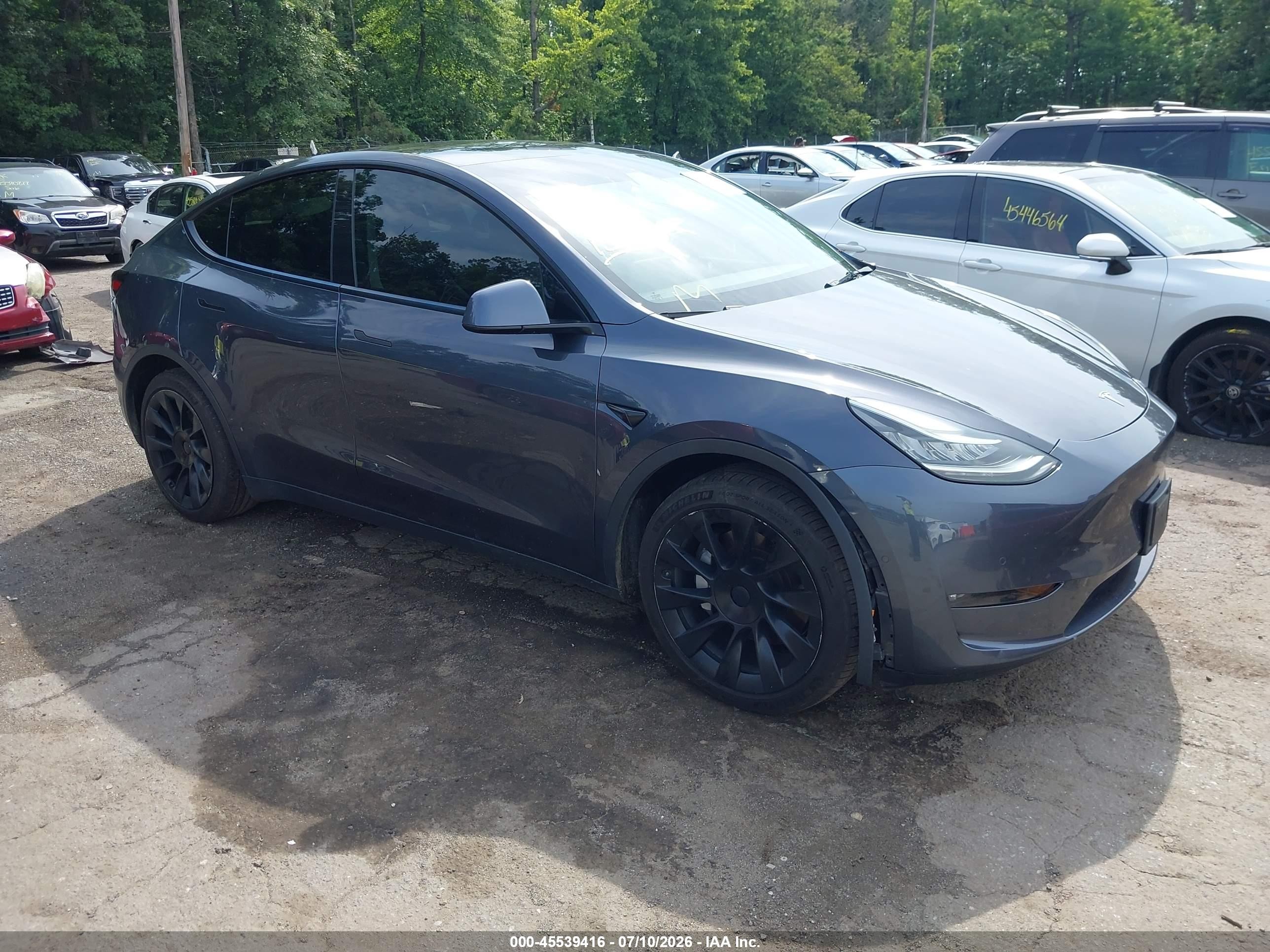 2021 Tesla Model Y Long Range, VIN 5YJYGDEE3MF297654 — Undercarriage