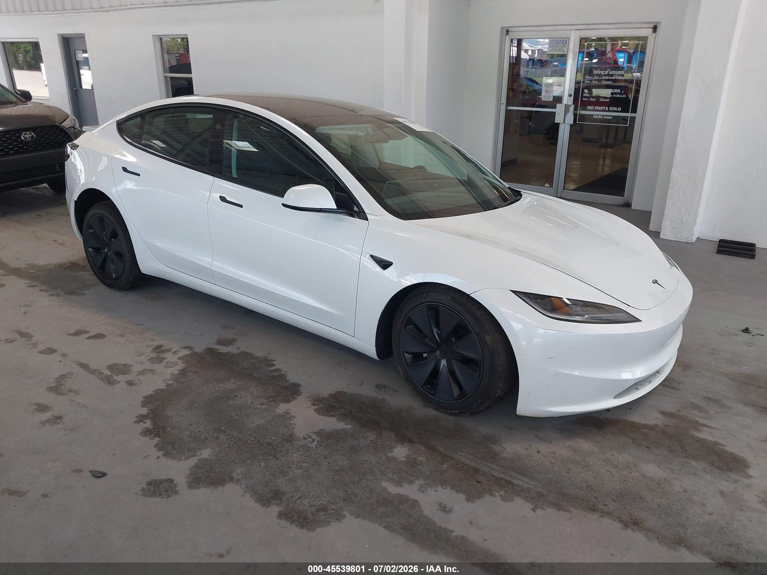2026 Tesla Model 3 Premium, VIN 5YJ3E1EA4TF174228 — Front end
