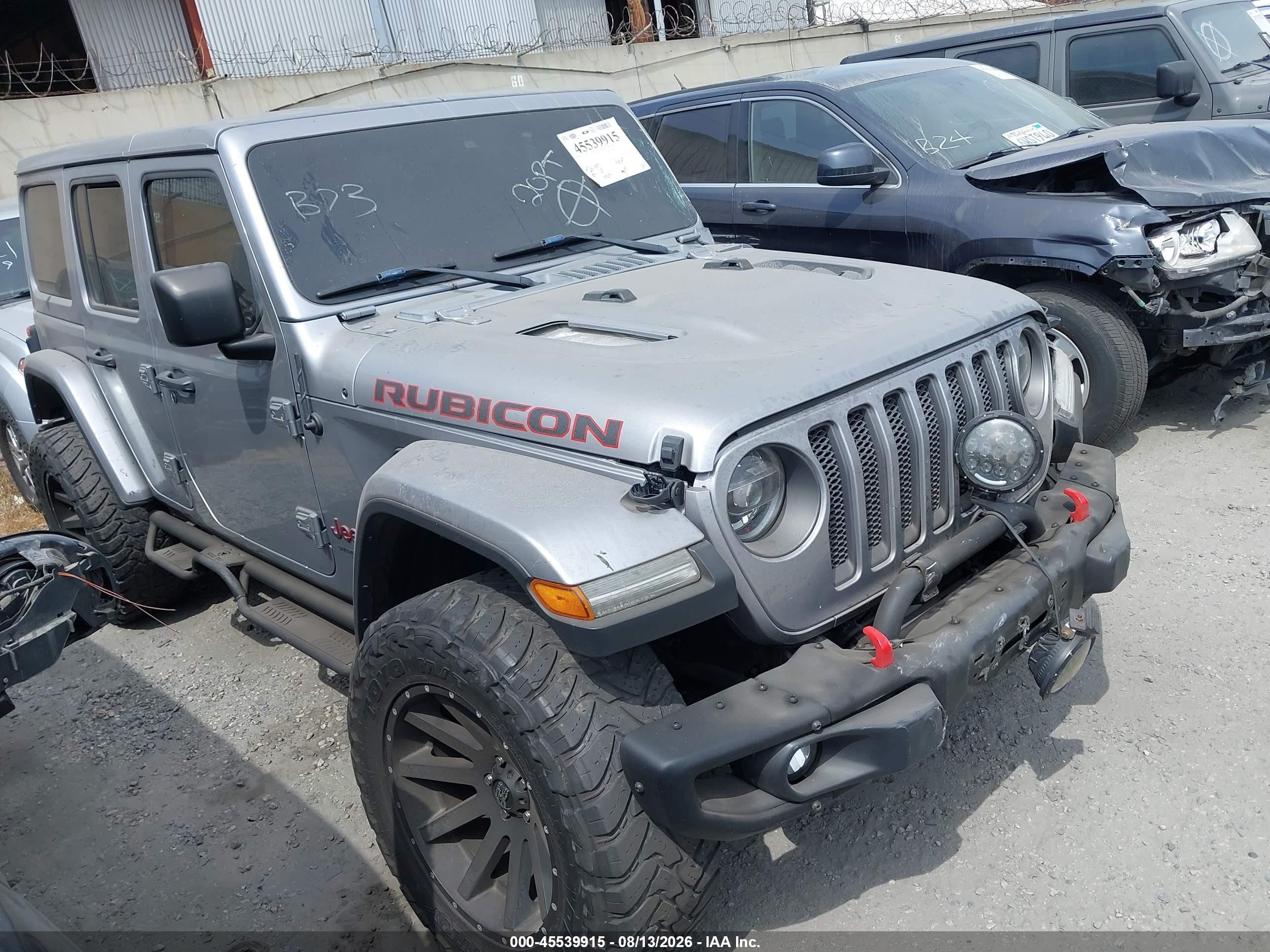 2019 Jeep Wrangler Unlimited Rubicon, VIN 1C4HJXFG6KW661433 — Side