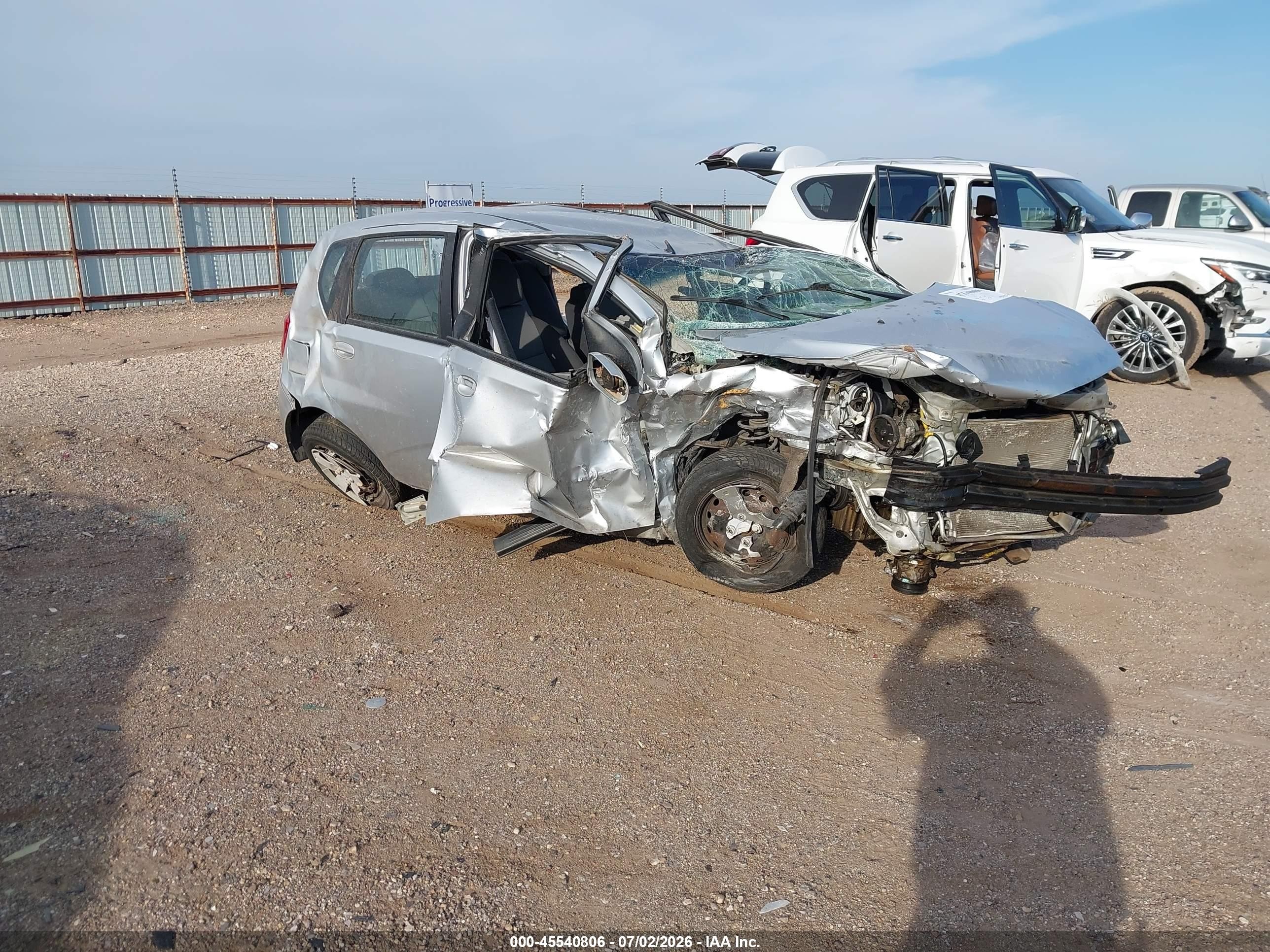 2011 Chevrolet Aveo 1LT, VIN KL1TD6DE5BB212899 — Rollover