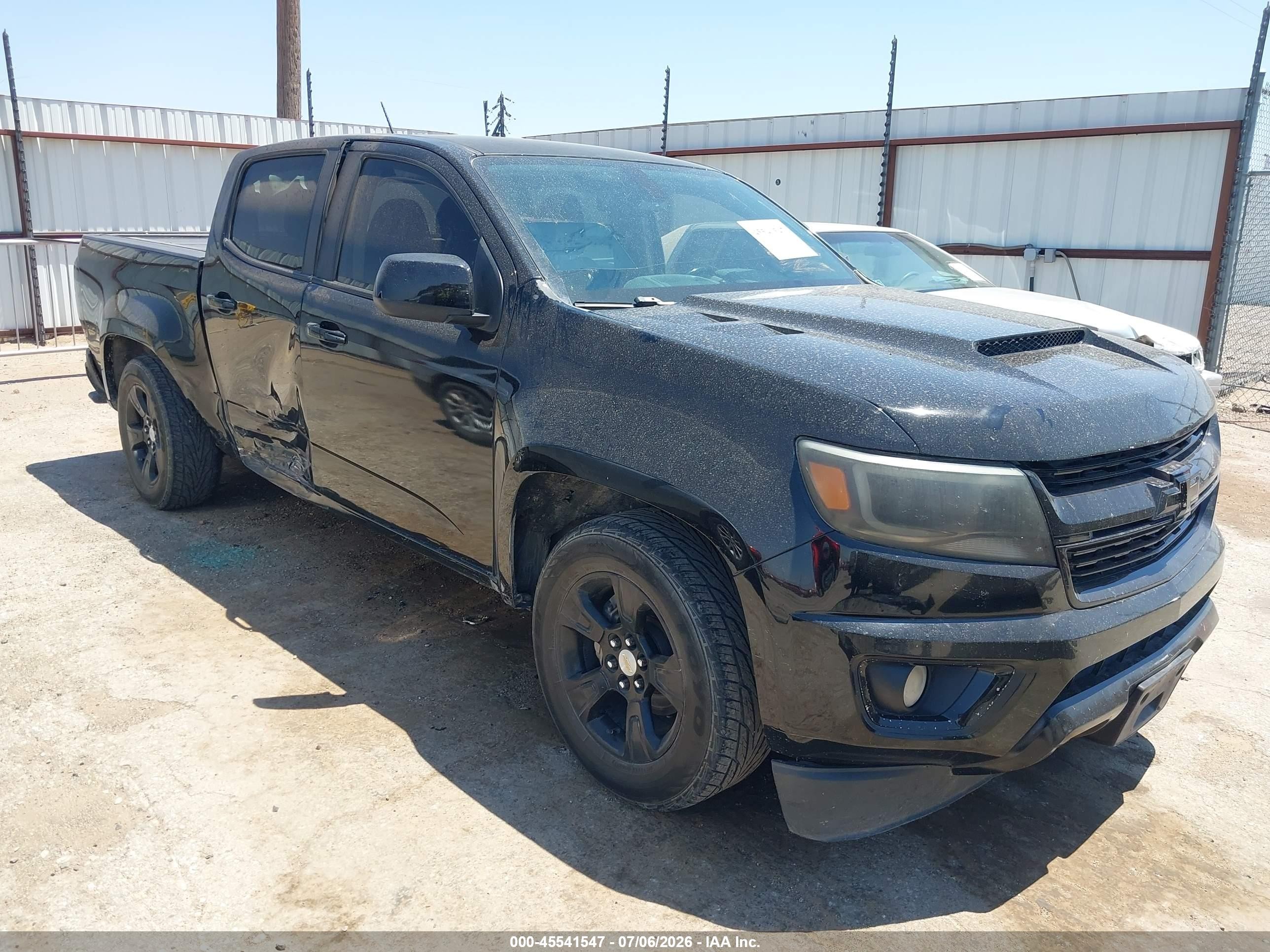 2015 Chevrolet Colorado 2WD Z71, VIN 1GCGSCE35F1235817 — Бок