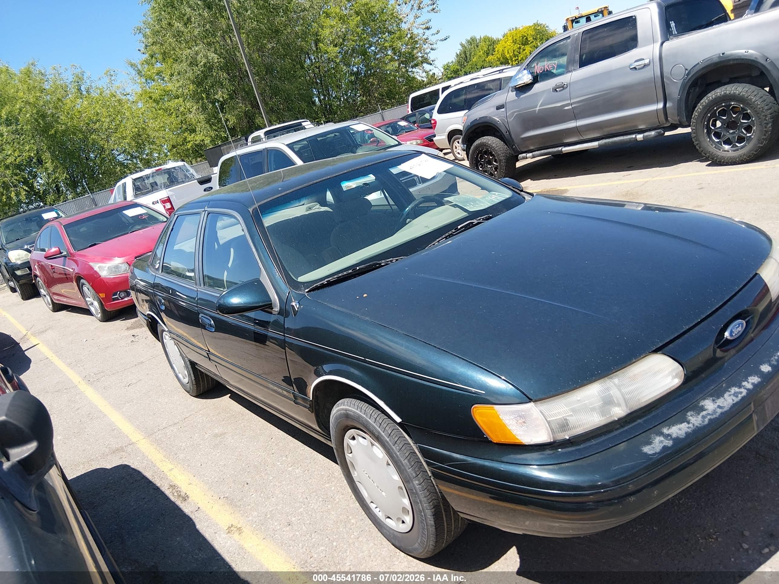 1994 Ford Taurus GL, VIN 1FALP5240RG160444 — Normal wear