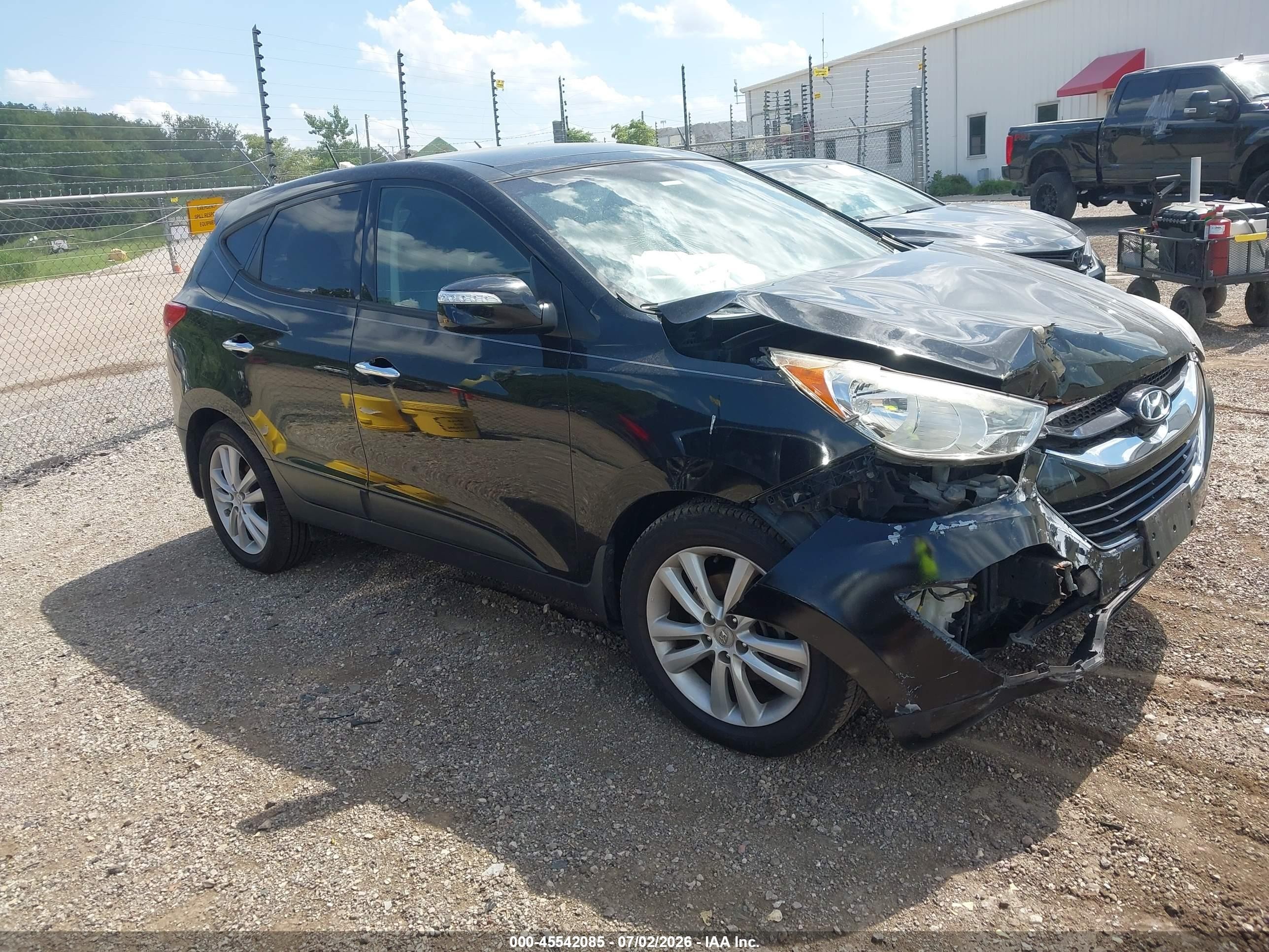 2012 Hyundai Tucson GLS, VIN KM8JUCAC3CU402641 — Front end