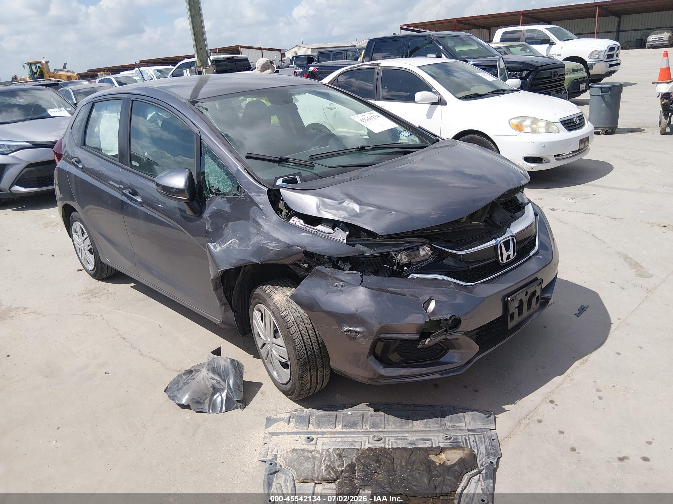 2020 Honda Fit LX, VIN 3HGGK5H48LM720436 — Бок