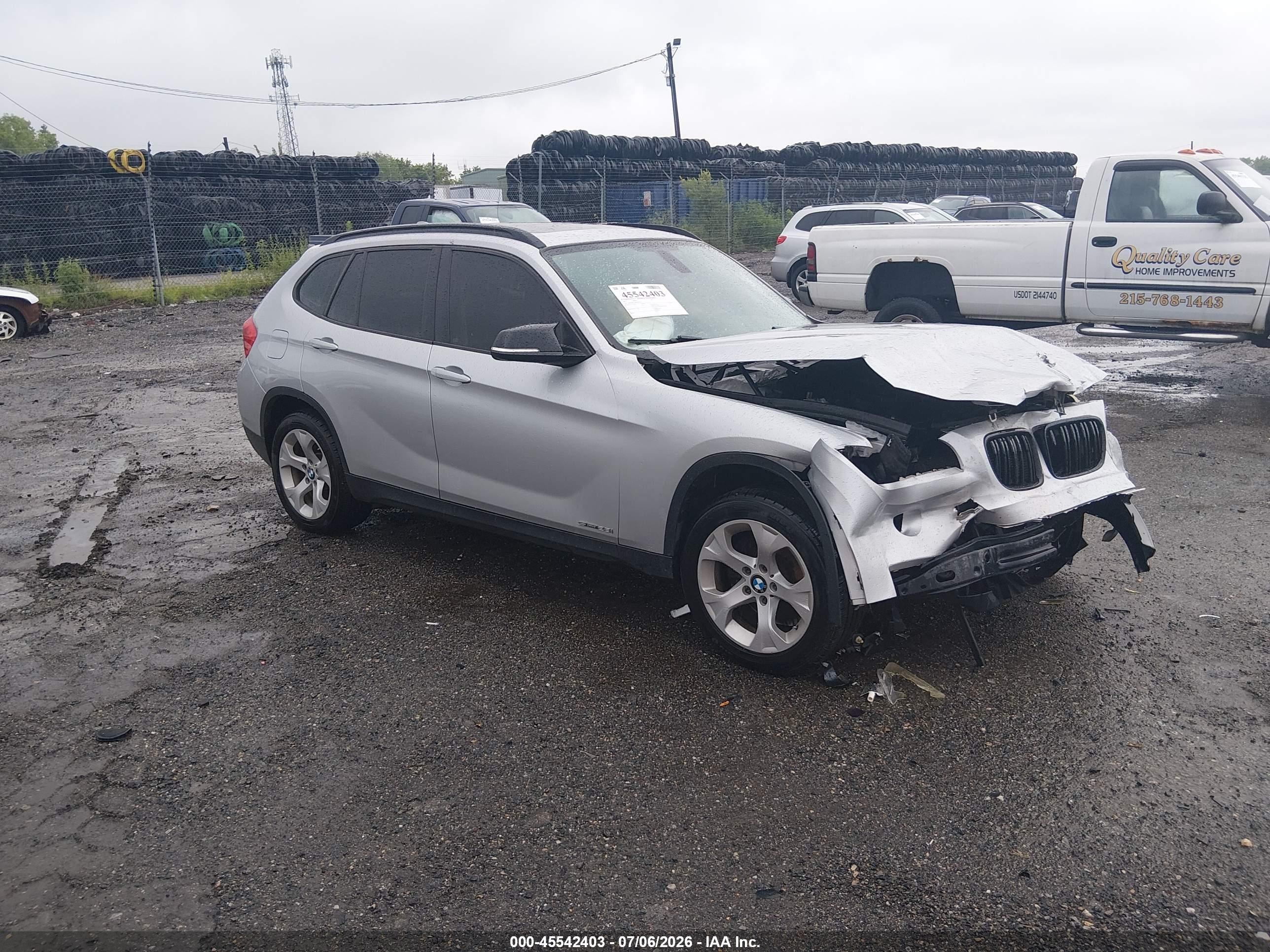 2013 BMW X1 28i, VIN WBAVM1C50DVW45051 — Front end