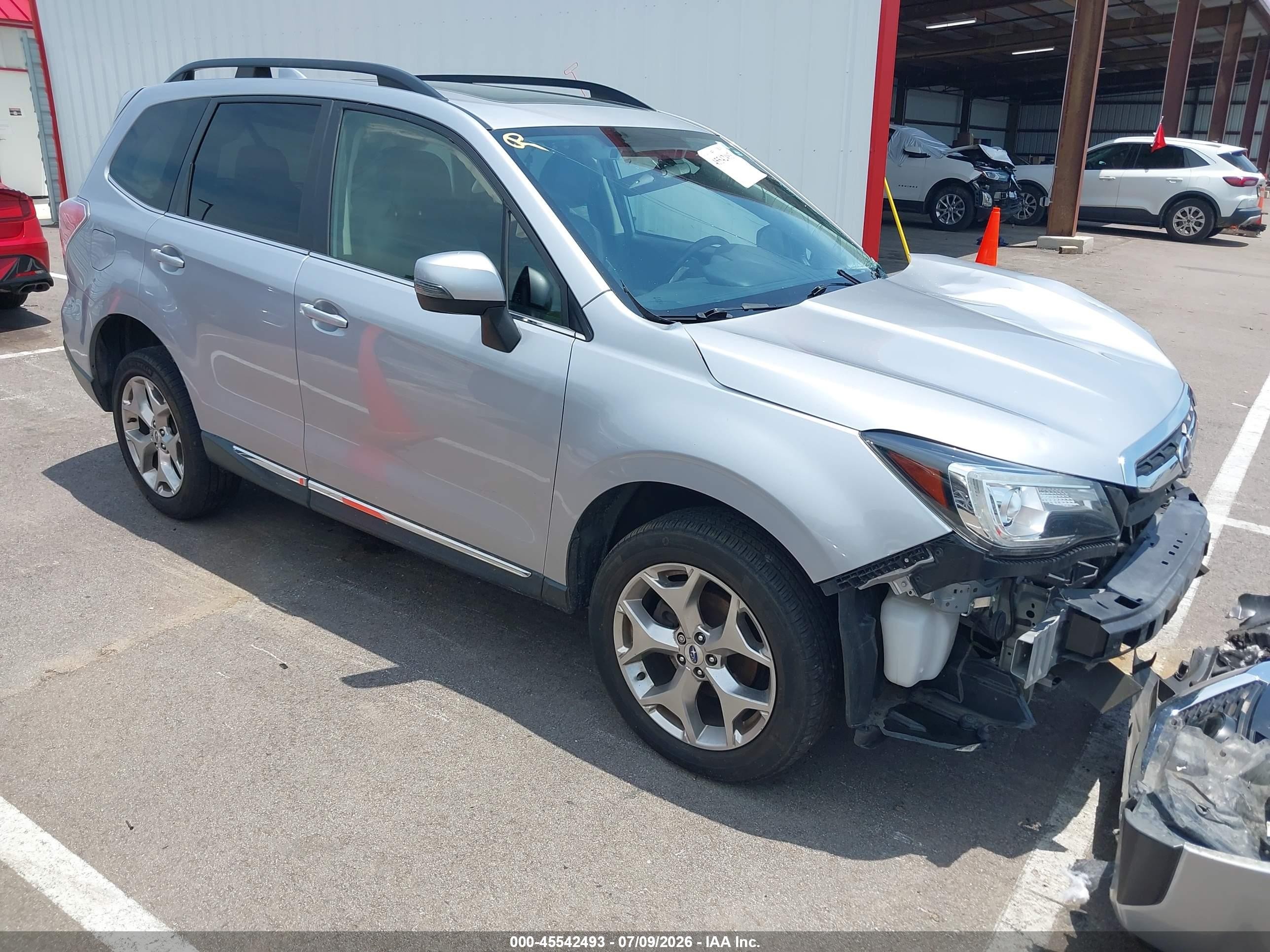 2017 Subaru Forester Touring, VIN JF2SJAWC9HH558702 — Front end