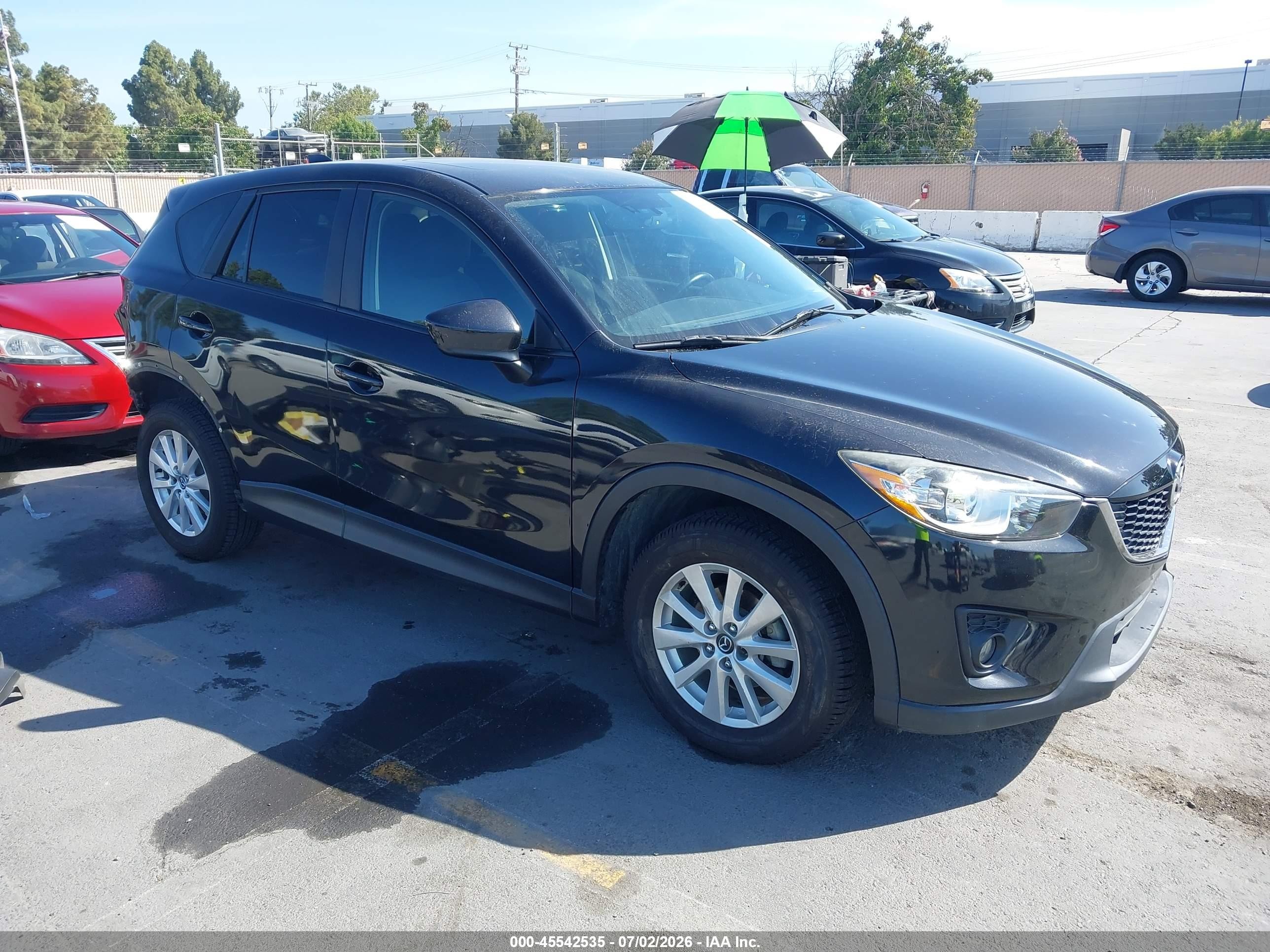 2013 Mazda CX-5 Touring, VIN JM3KE4CE1D0110027 — Зад