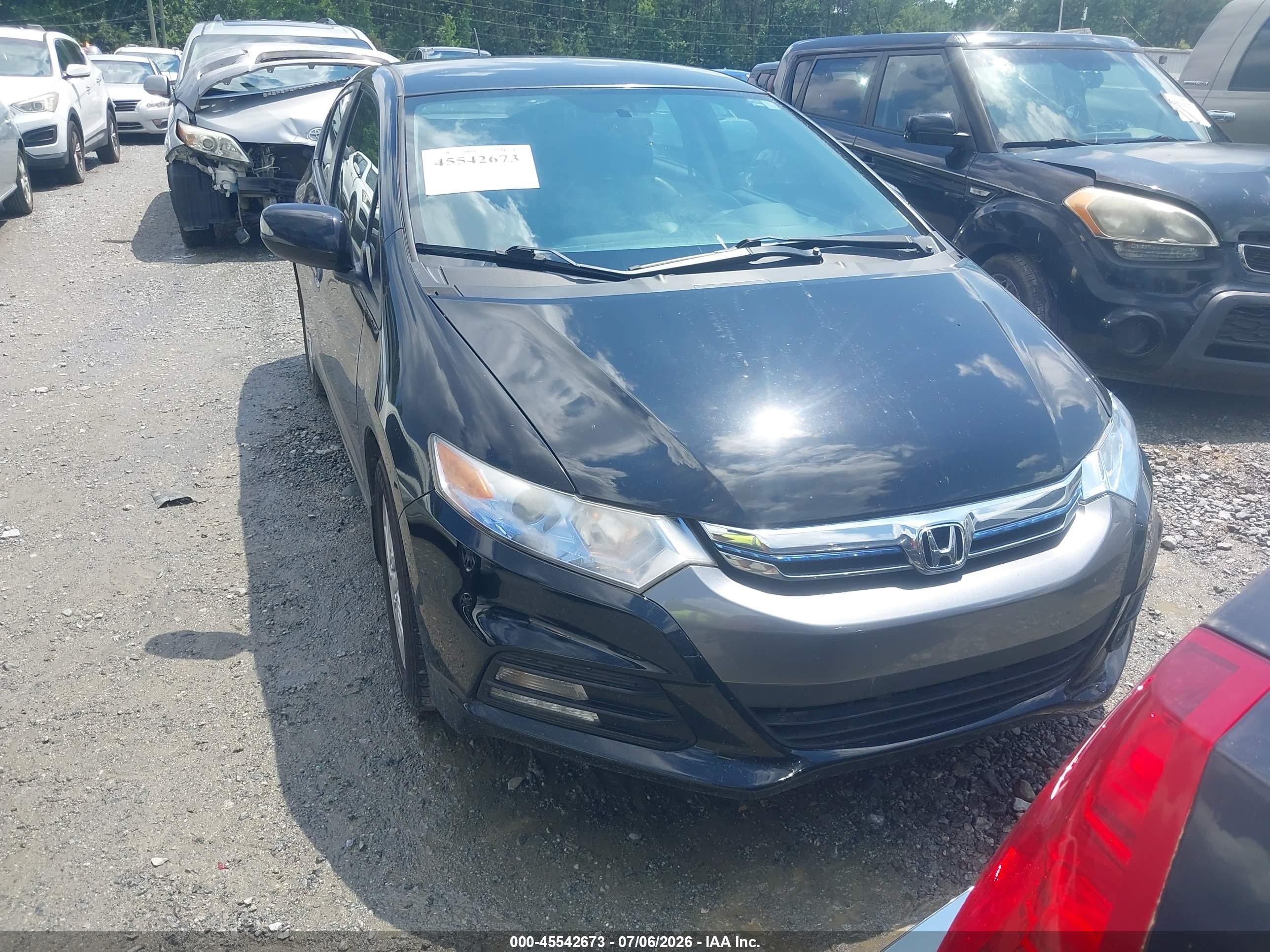 2013 Honda Insight EX, VIN JHMZE2H75DS006195 — Side