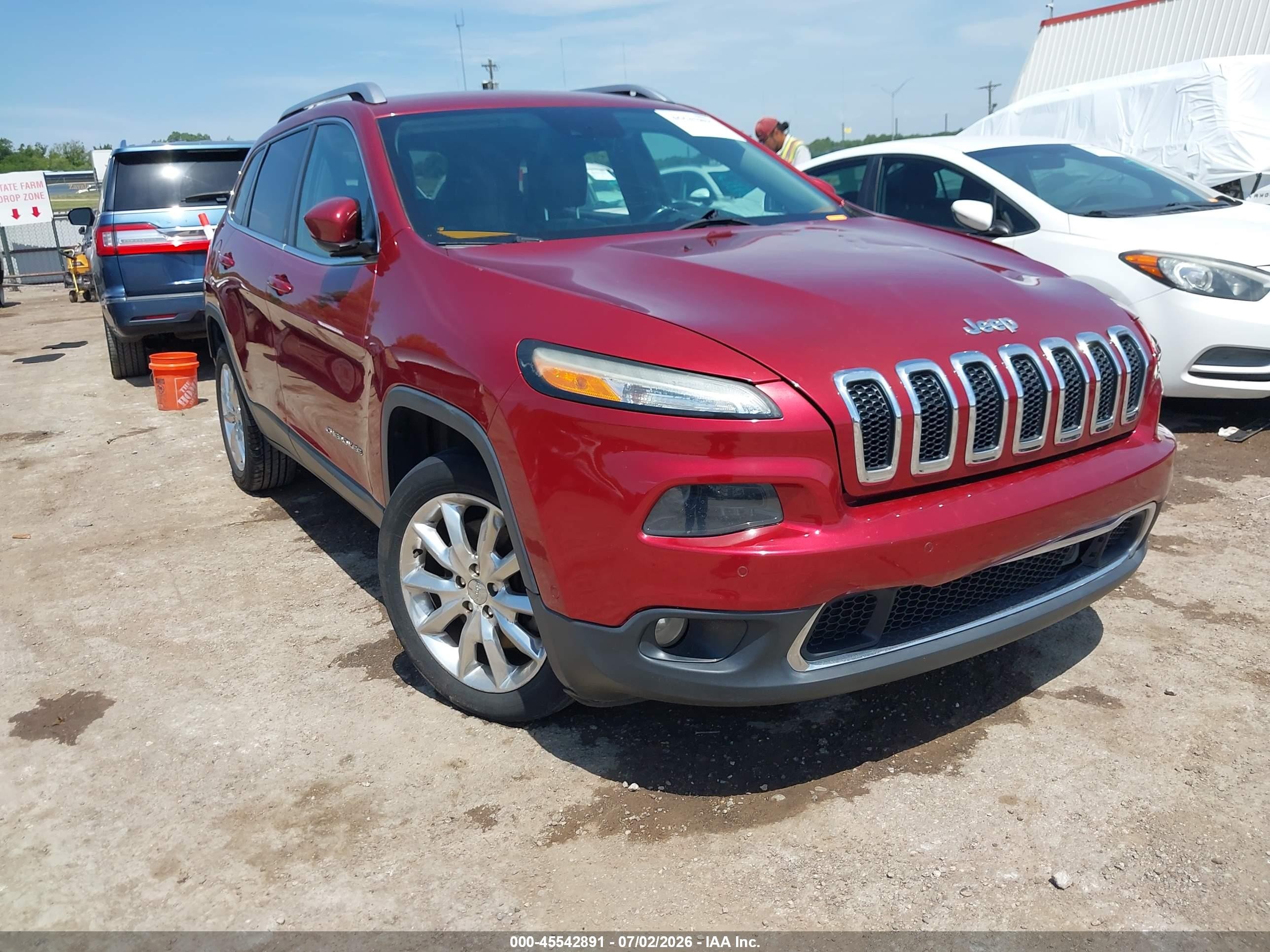 2014 Jeep Cherokee Limited, VIN 1C4PJLDS6EW200197 — Side