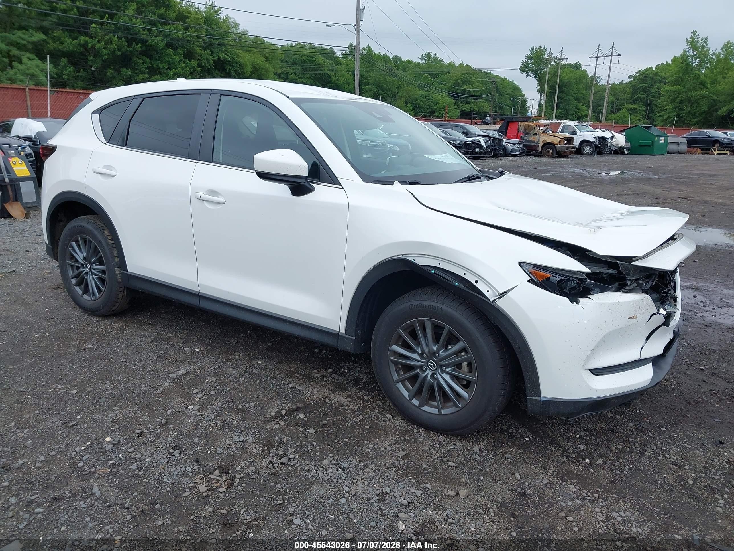2021 Mazda CX-5 Touring, VIN JM3KFBCM2M0480637 — Front end