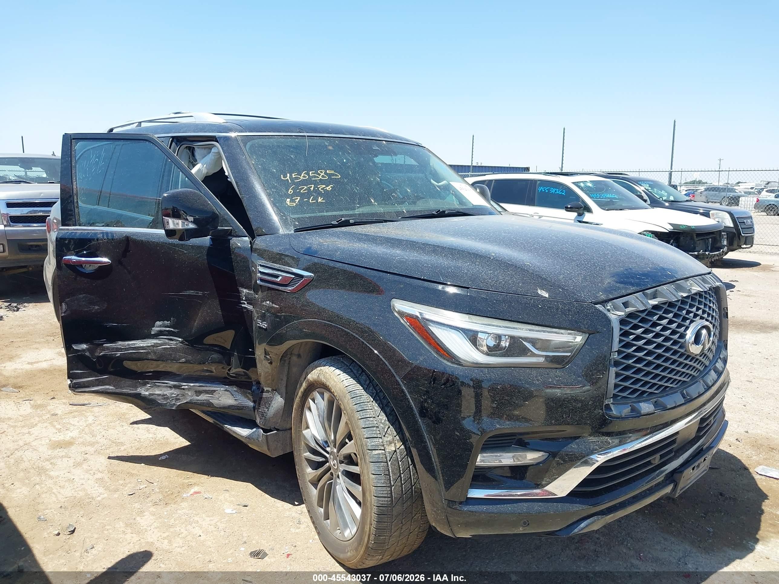 2019 Infiniti QX80 Luxe, VIN JN8AZ2ND9K9850116 — Бок