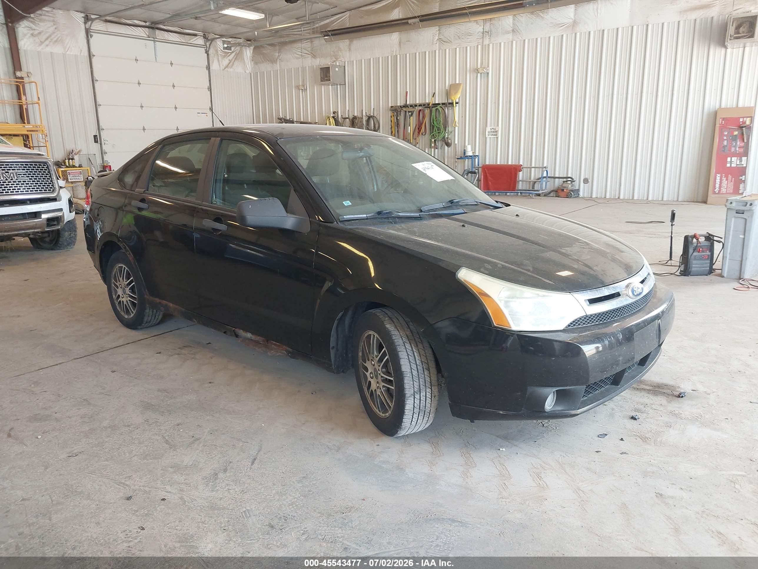 2011 Ford Focus SE, VIN 1FAHP3FN3BW146191 — Side