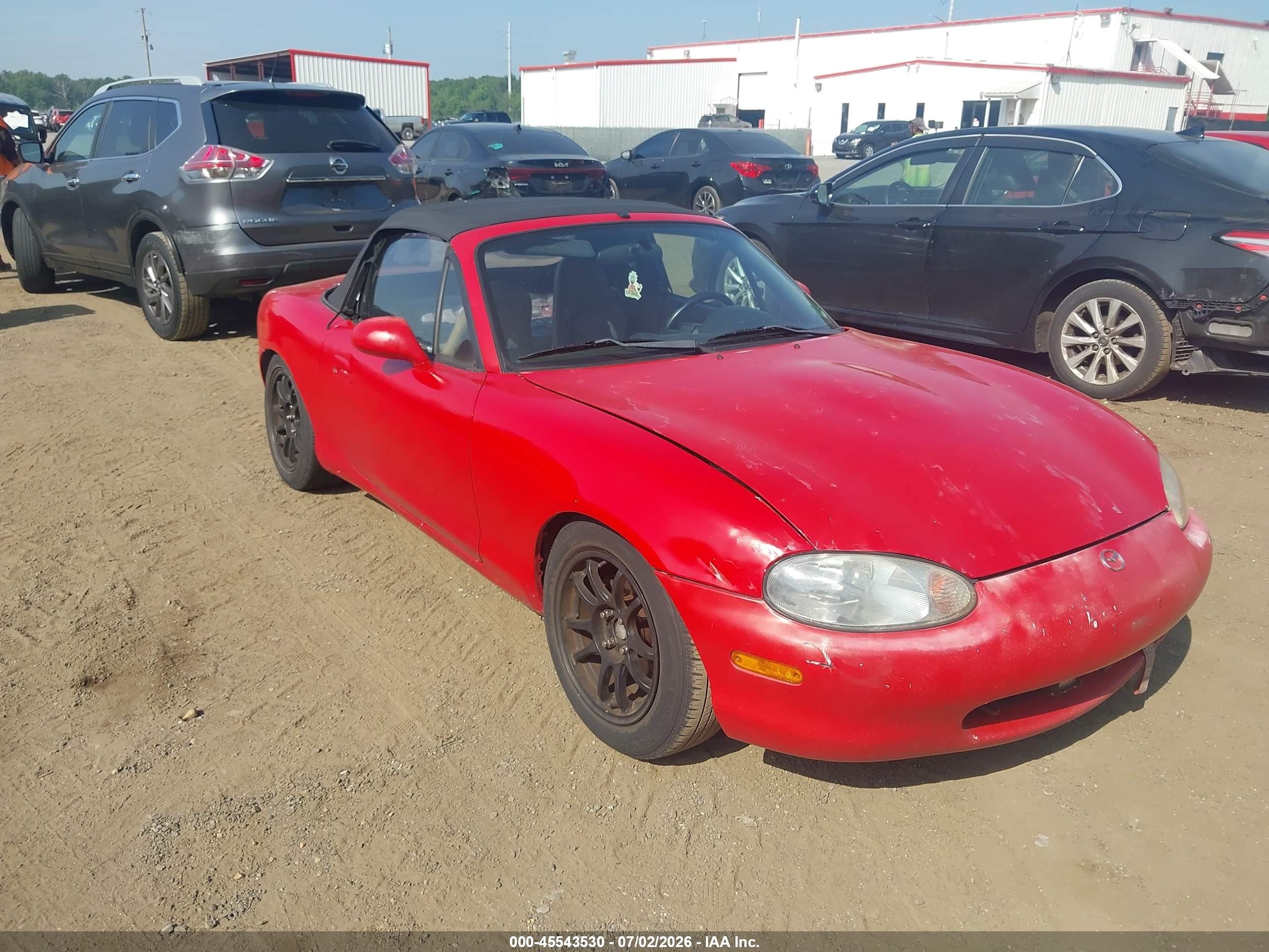1999 Mazda MX-5 Miata, VIN JM1NB3533X0110734 — Normal wear