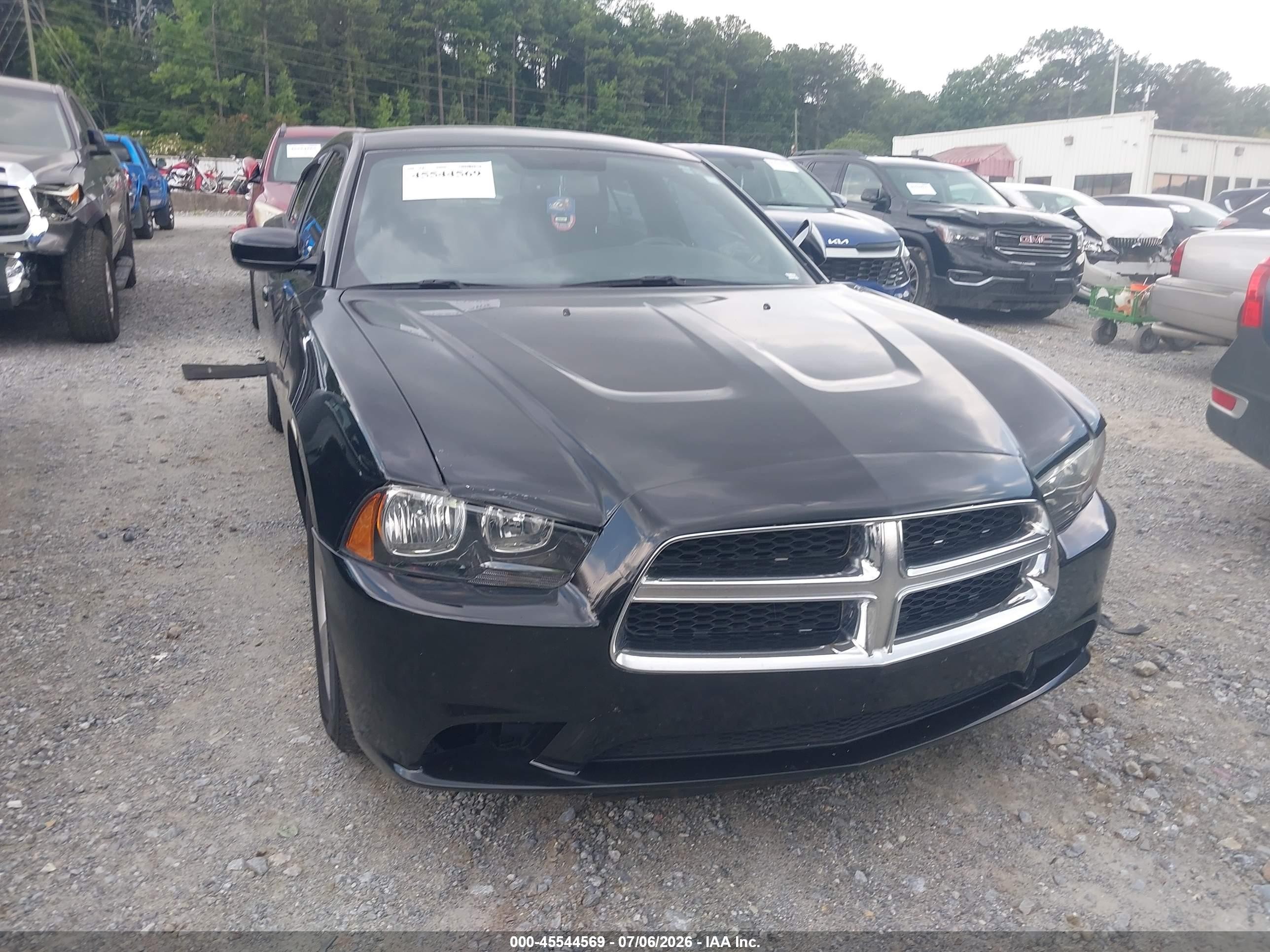 2012 Dodge Charger SE, VIN 2C3CDXBGXCH187174 — Side