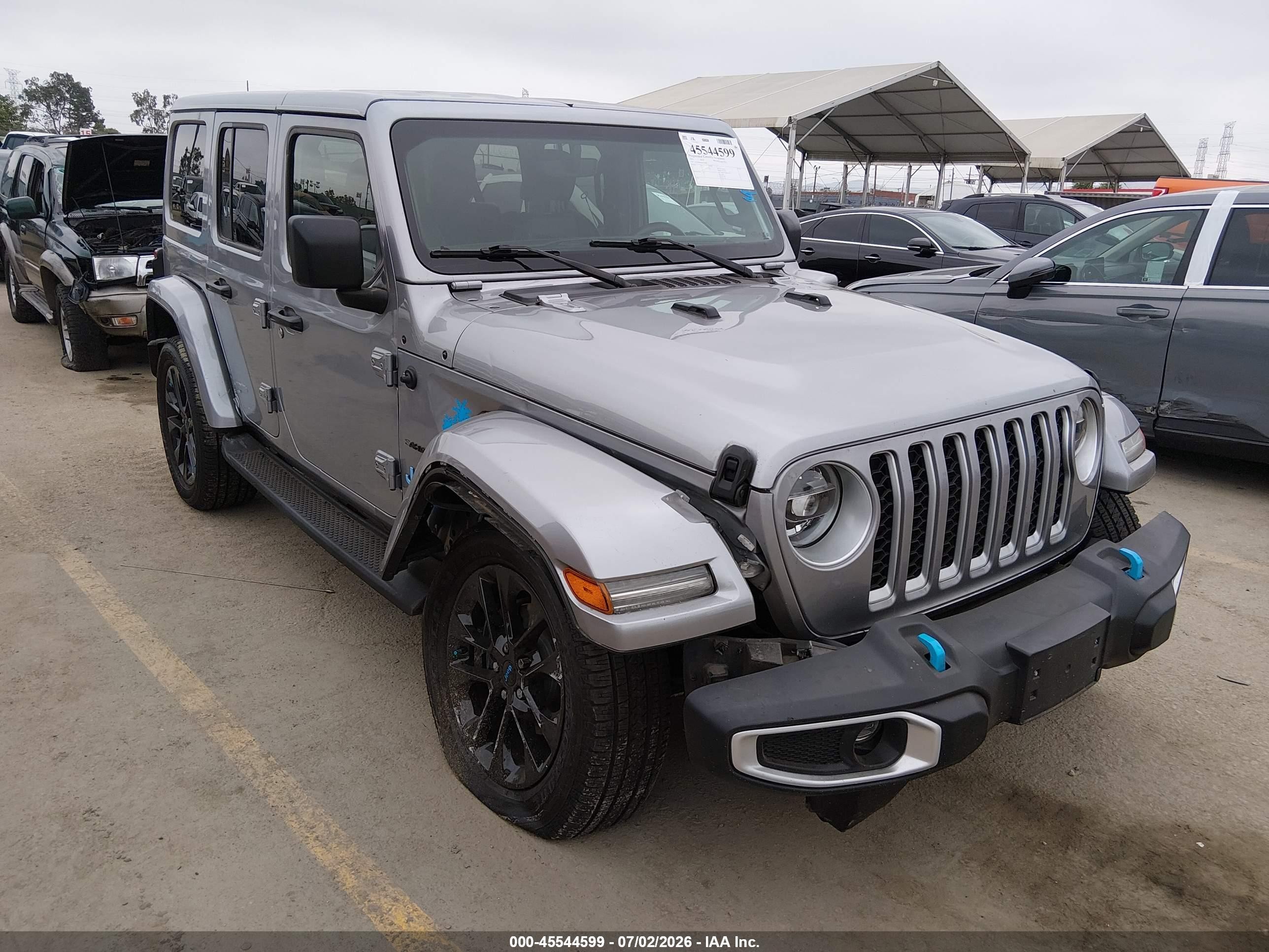 2021 Jeep Wrangler Unlimited Sahara High Altitude, VIN 1C4JJXP60MW704481 — Side