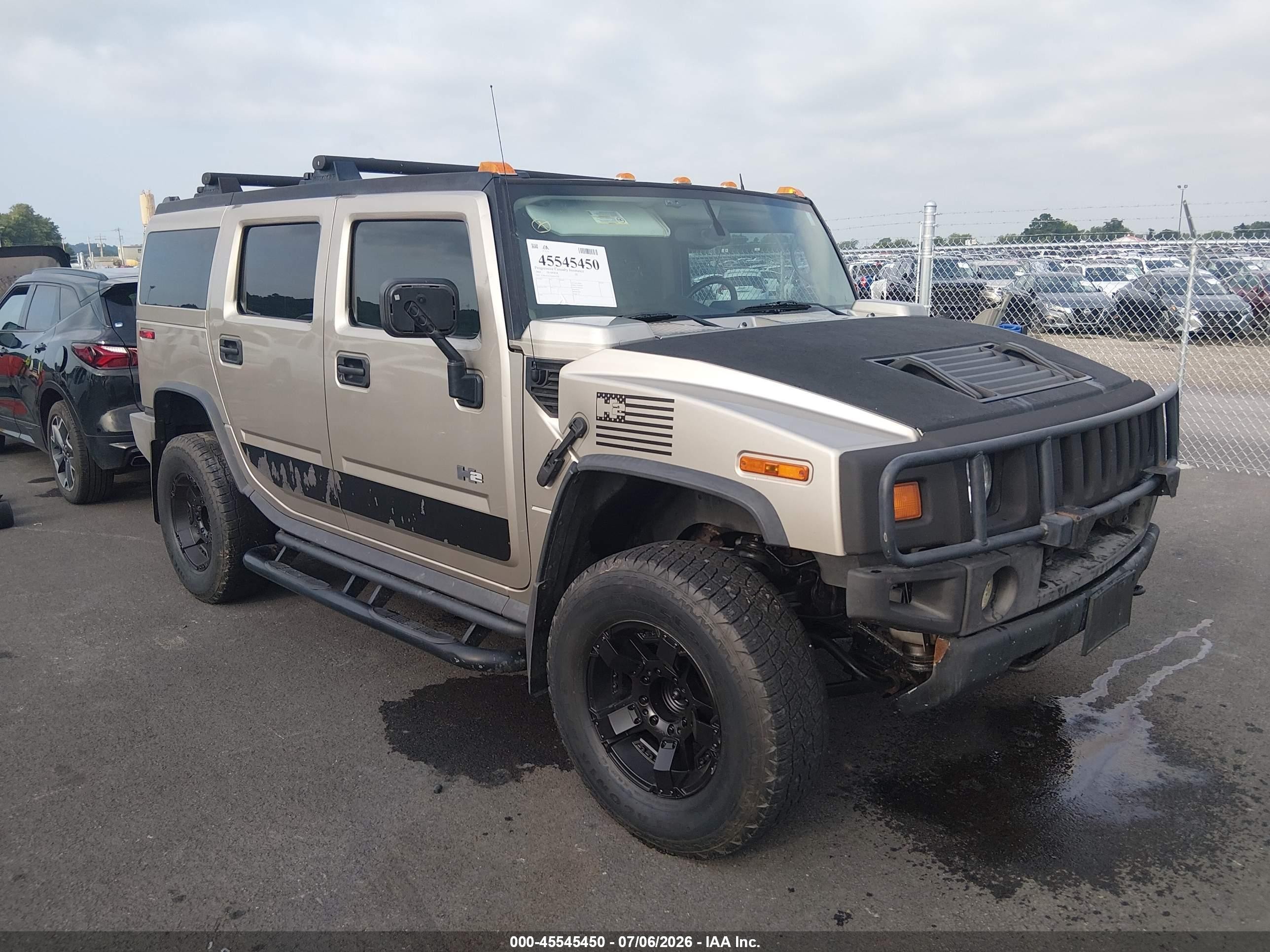 2004 Hummer H2, VIN 5GRGN23UX4H105774 — Side