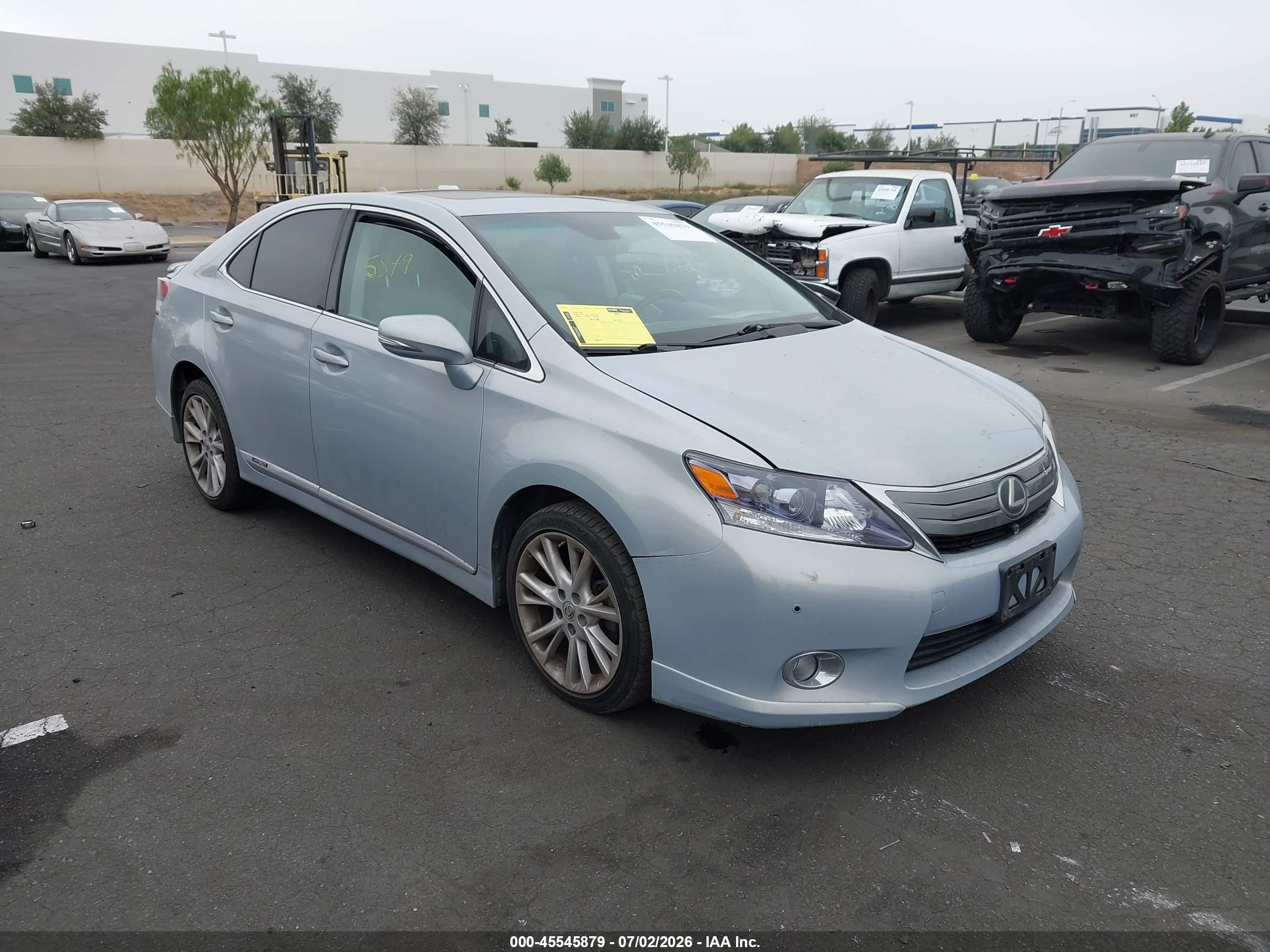2010 Lexus HS 250h Premium, VIN JTHBB1BA1A2013925 — Side