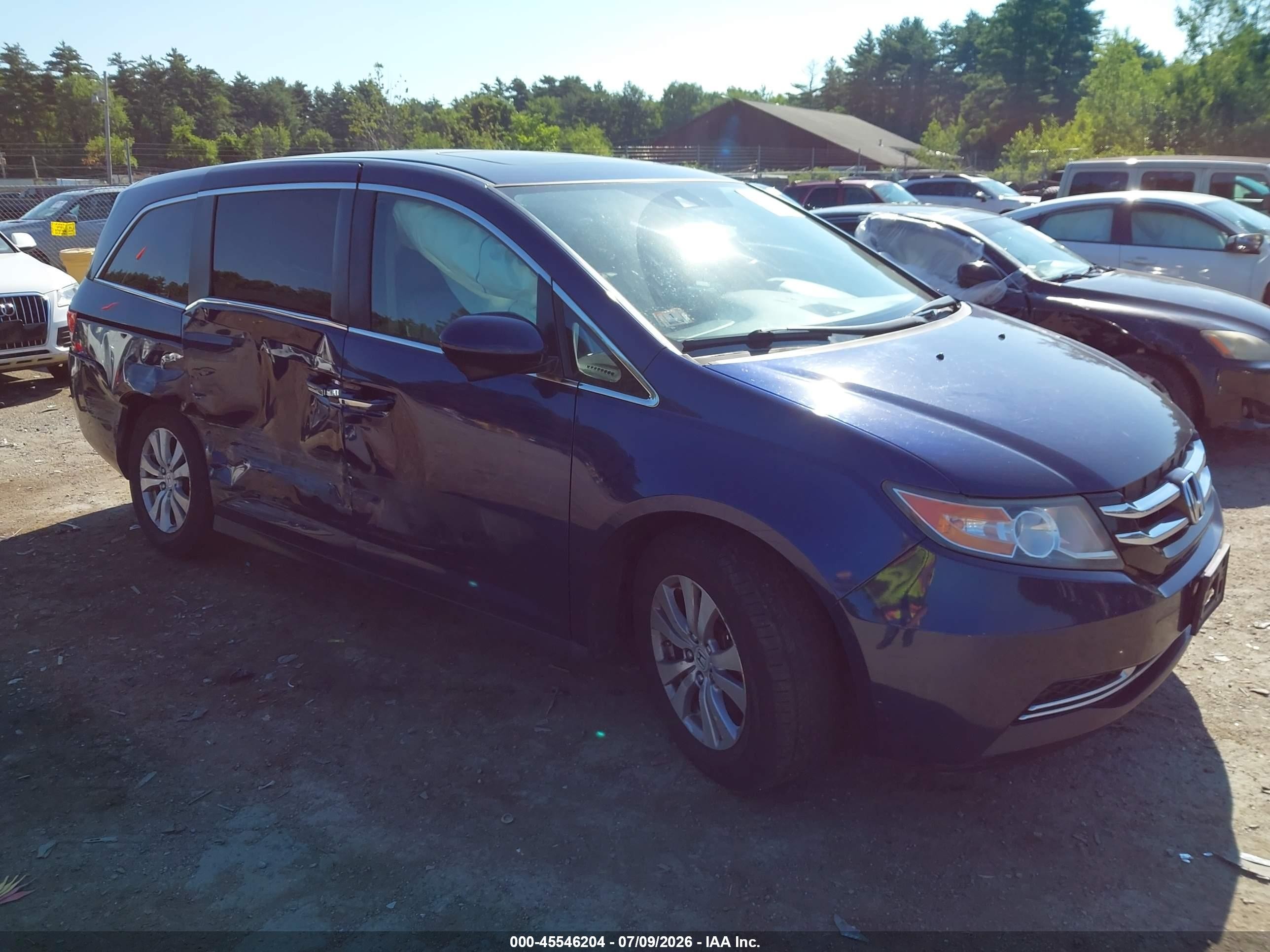 2015 Honda Odyssey EX-L, VIN 5FNRL5H69FB117395 — Side