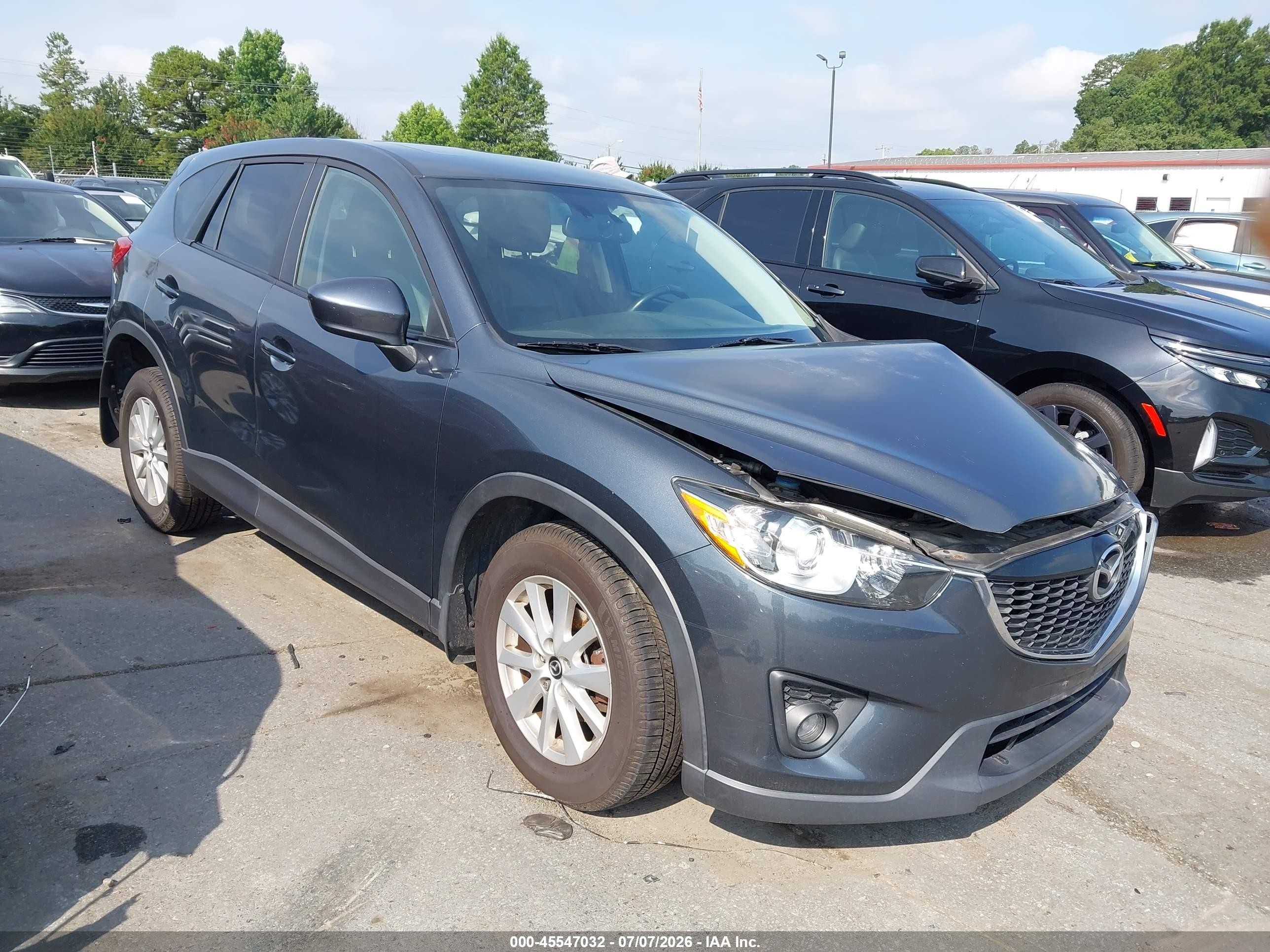 2013 Mazda CX-5 Touring, VIN JM3KE4CEXD0126338 — Перед