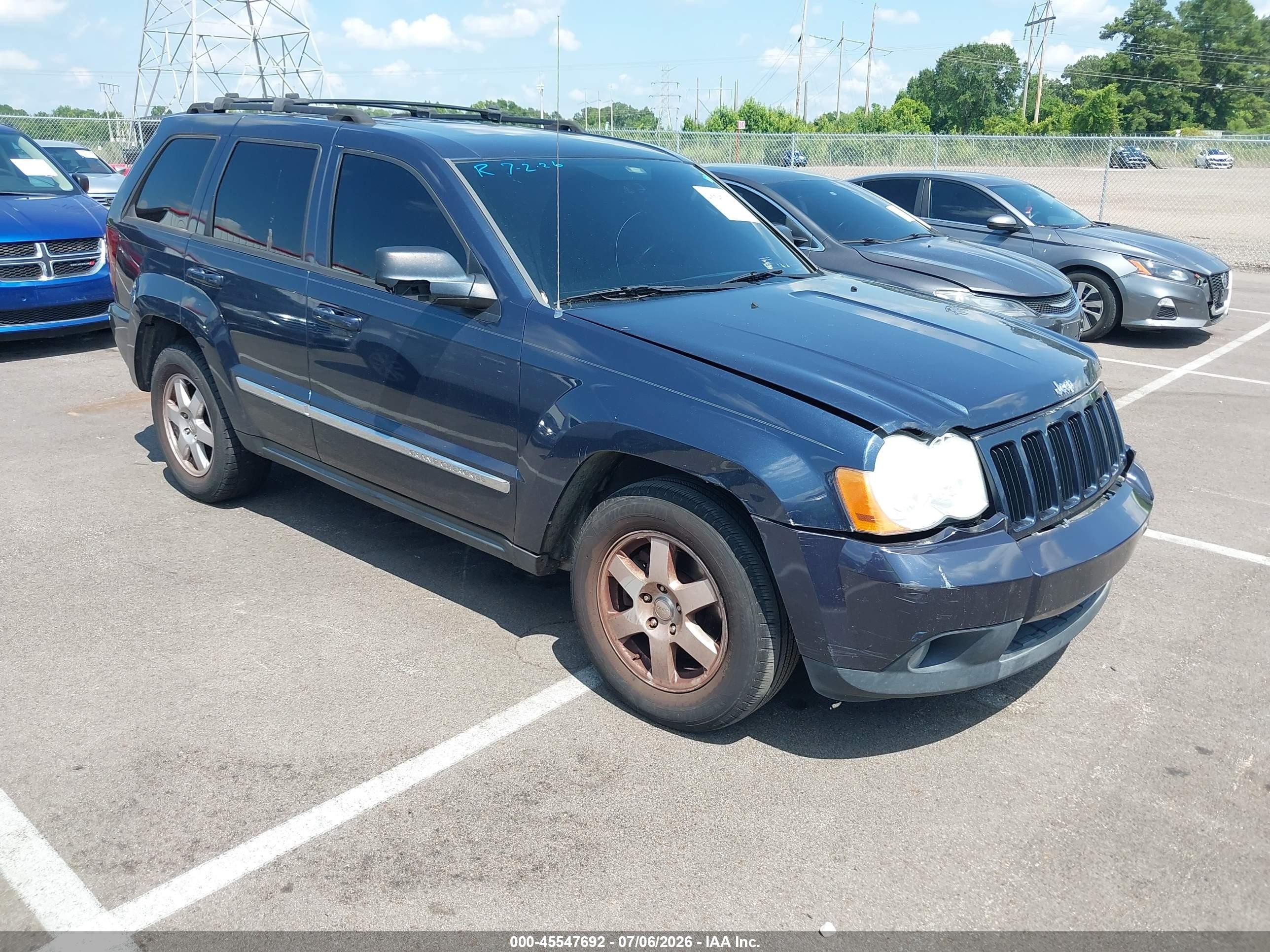 2010 Jeep Grand Cherokee Laredo, VIN 1J4PS4GK0AC148005 — Normal wear