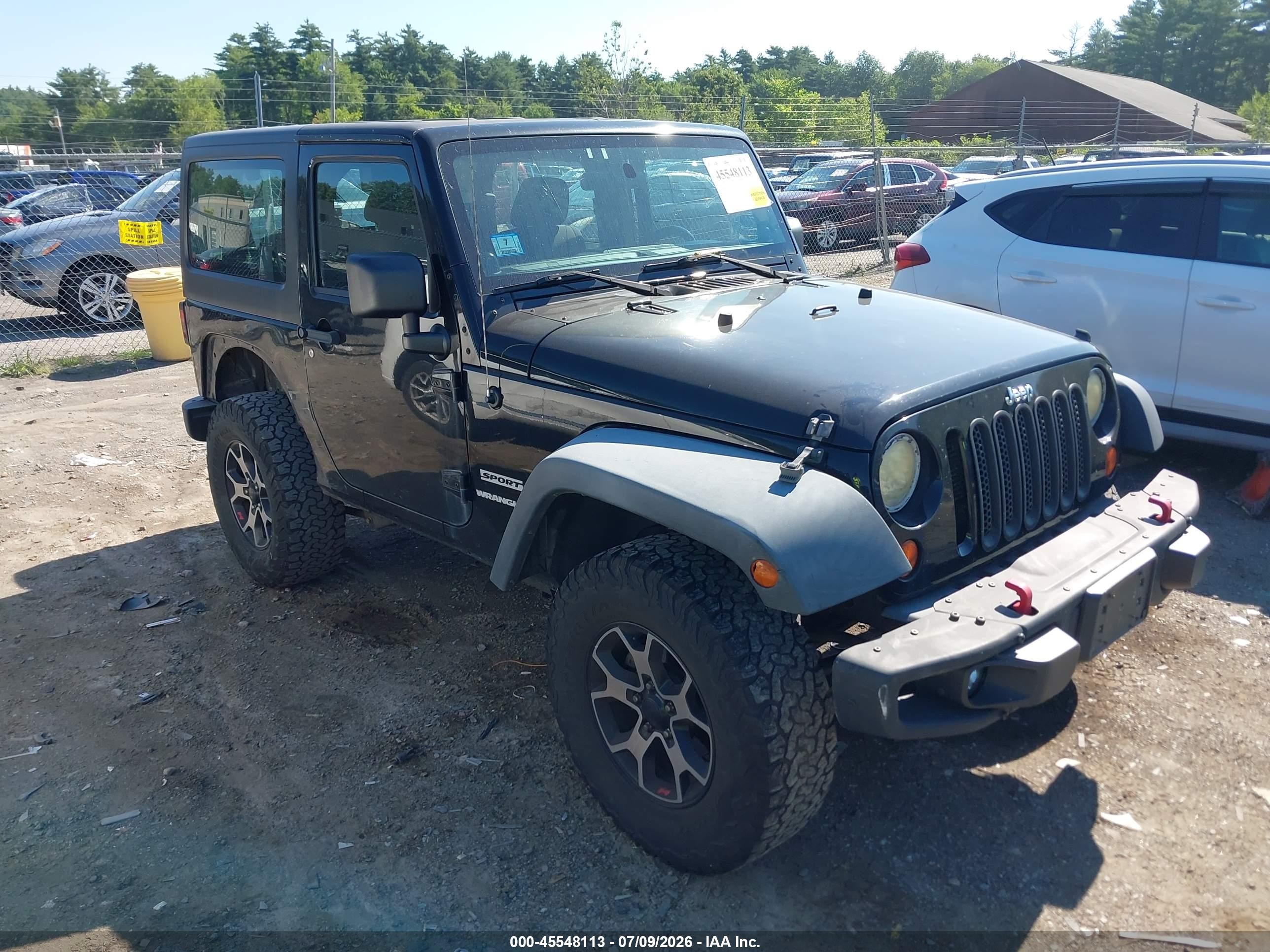 2012 Jeep Wrangler Sport, VIN 1C4AJWAG0CL130413 — Side