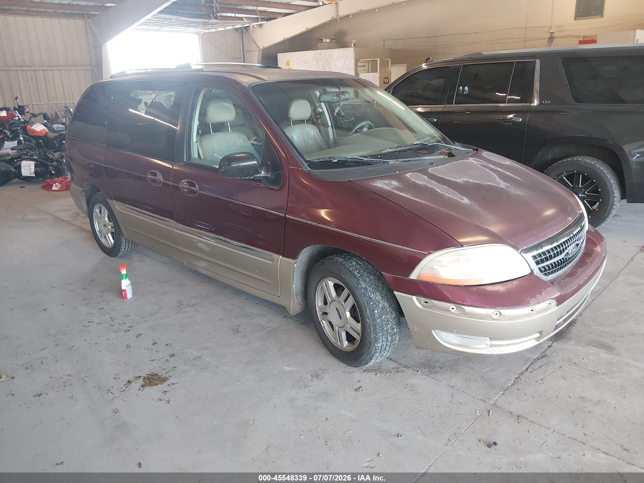 2000 Ford Windstar SEL, VIN 2FMZA5340YBA10923 — Normal wear